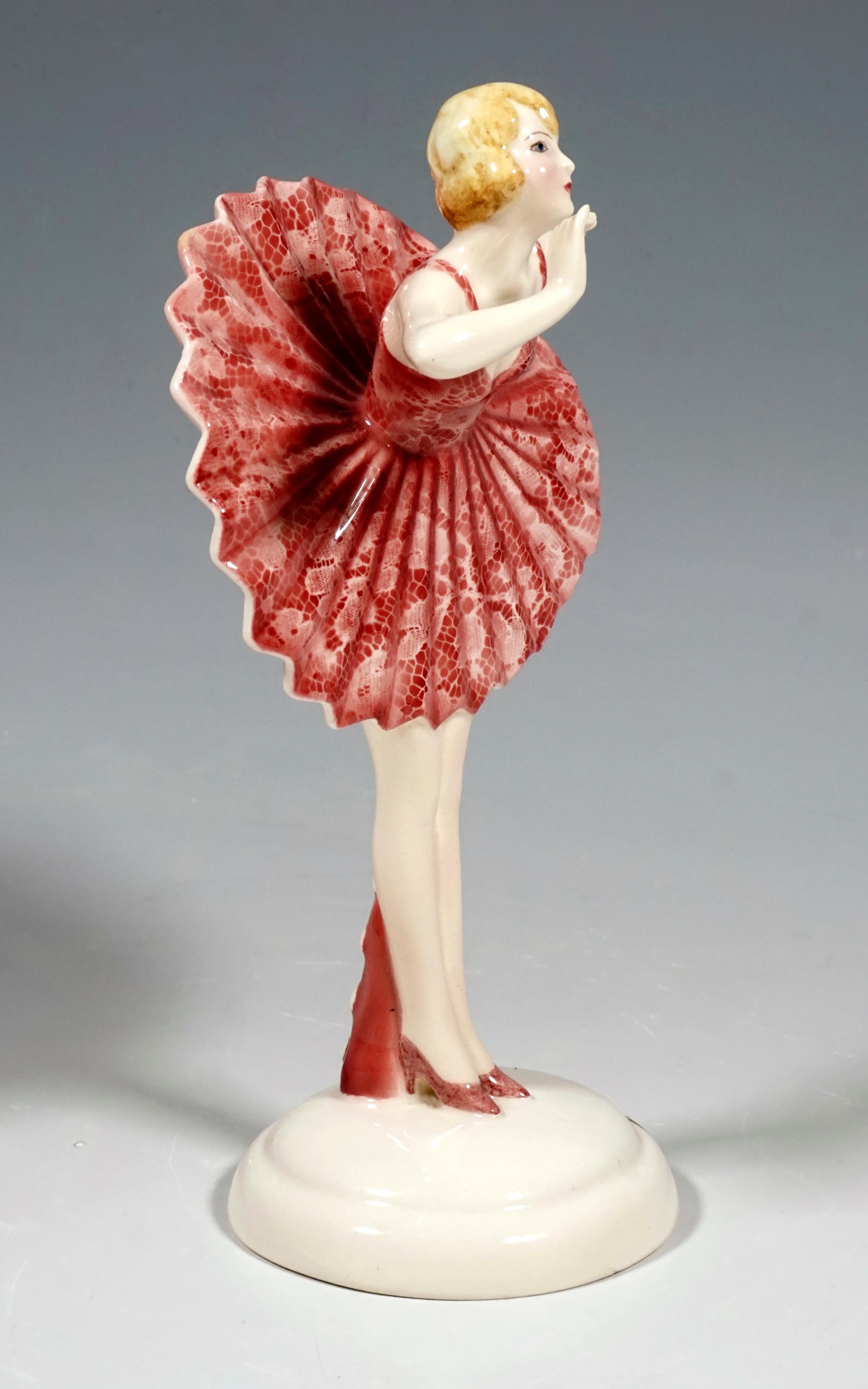 Remarkable Art Deco Goldscheider Ceramics Figurine of the 1930s.
The young dancer with short hair bows before her audience so that the pleated skirt with a zigzag hem stands up like a star. The Pierrette has put down her pointed hat on the floor