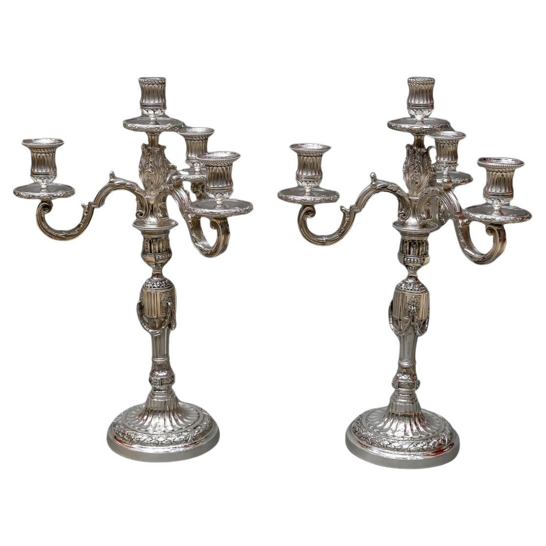 GOLDSMITH GASTON SIHNARD  Pair of Sold Silver Candelabra from the early 20th