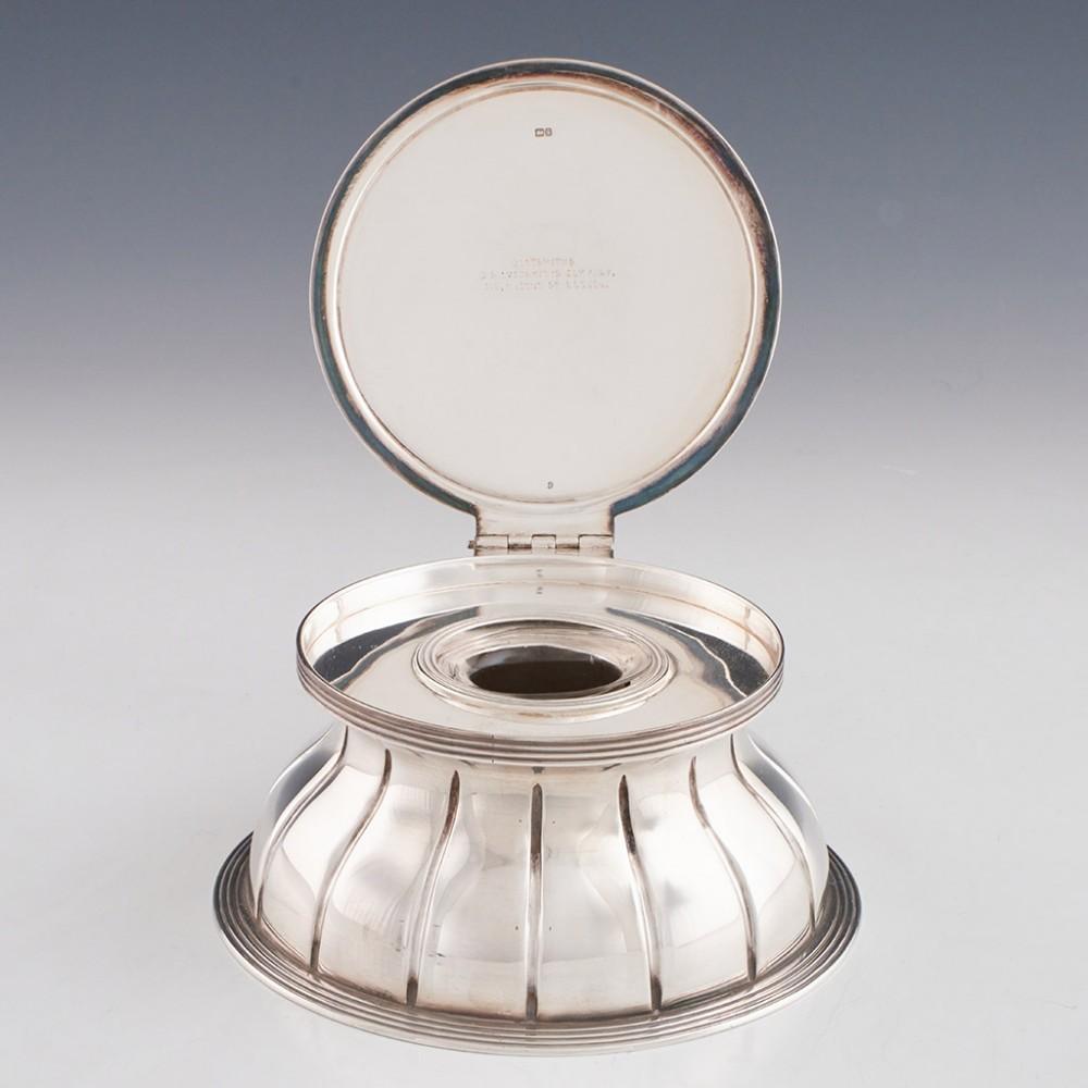 Heading : Goldsmiths and Silversmiths company inkwell
Date : Hallmarked in Birmingham in 1890 John Grinsell and Sons - retailed in London by the Golsmiths and Silversmiths Company.
Period : Victoria
Origin : Birmingham, England
Decoration : Silver