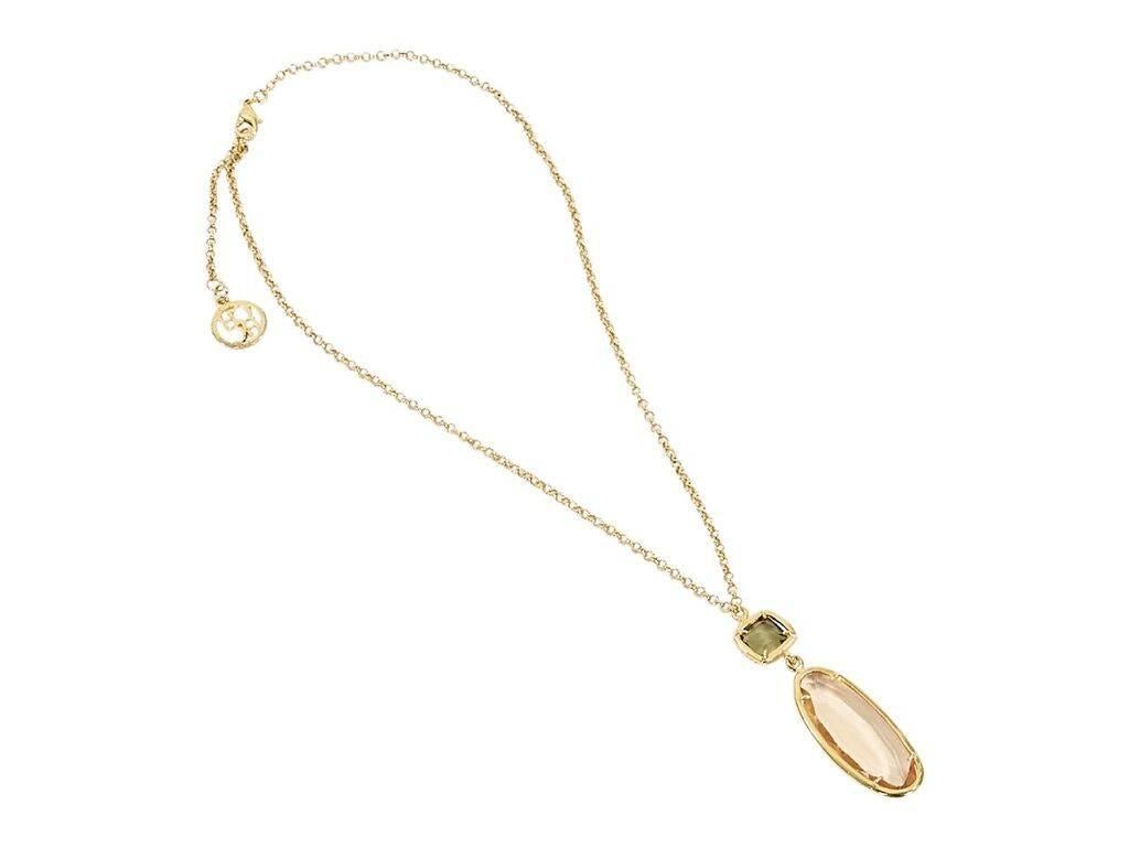 Product details:  Goldtone pendant necklace by Carolina Herrera.  Adjustable lobster clasp closure.  Double faceted crystal pendant drop.  Pave trim.  24