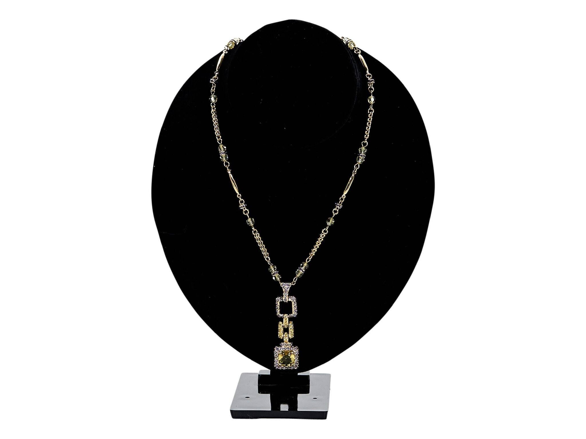 Product details:  Goldtone pendant necklace by St. John.  Accented with beads.  Embellished pendant with faceted crystal.  9