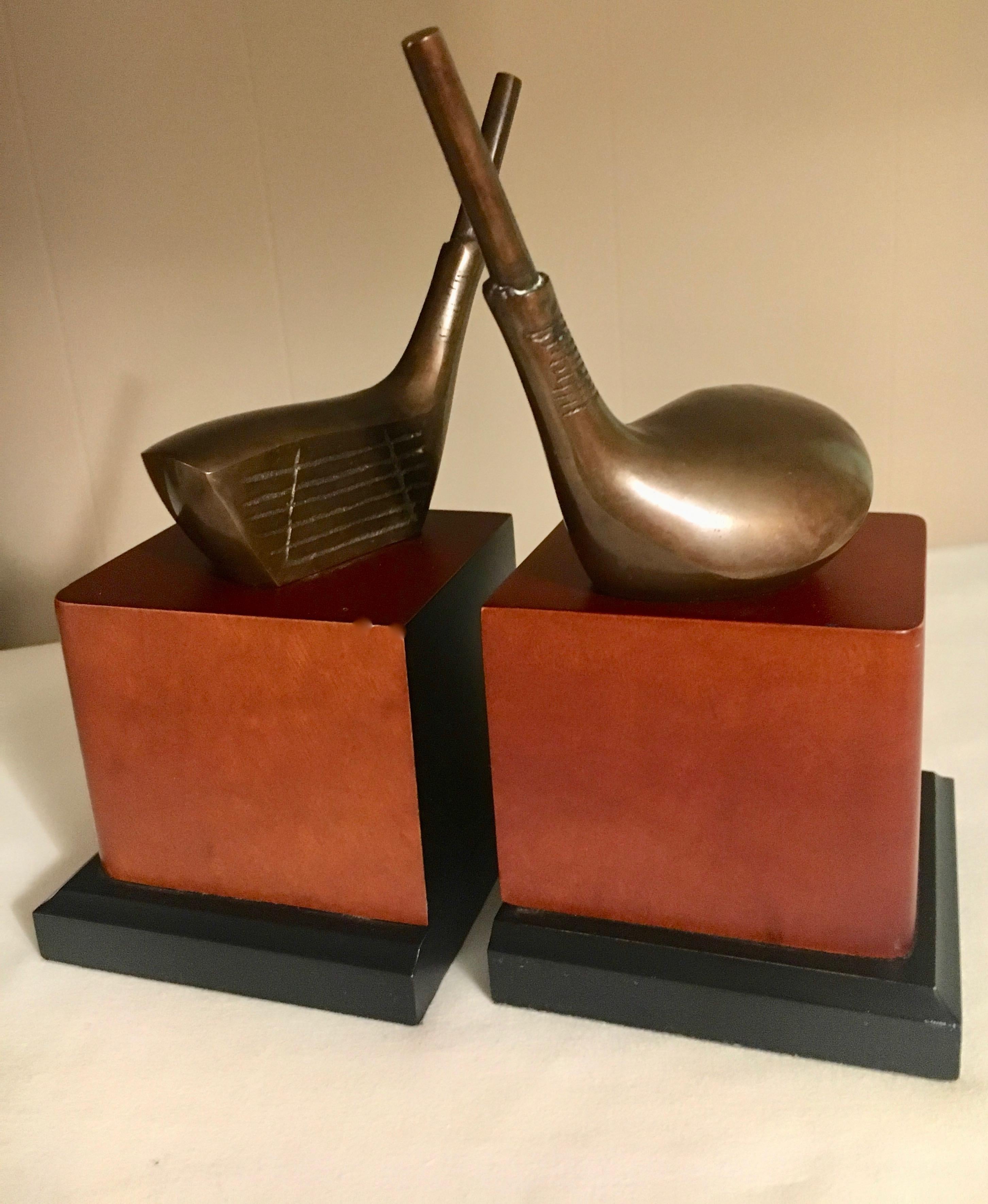 Golf bookends with portion of brass decorative club atop a wooden base - perfect decor or gift for the golf enthusiast. Great for Fathers day or your boss... 