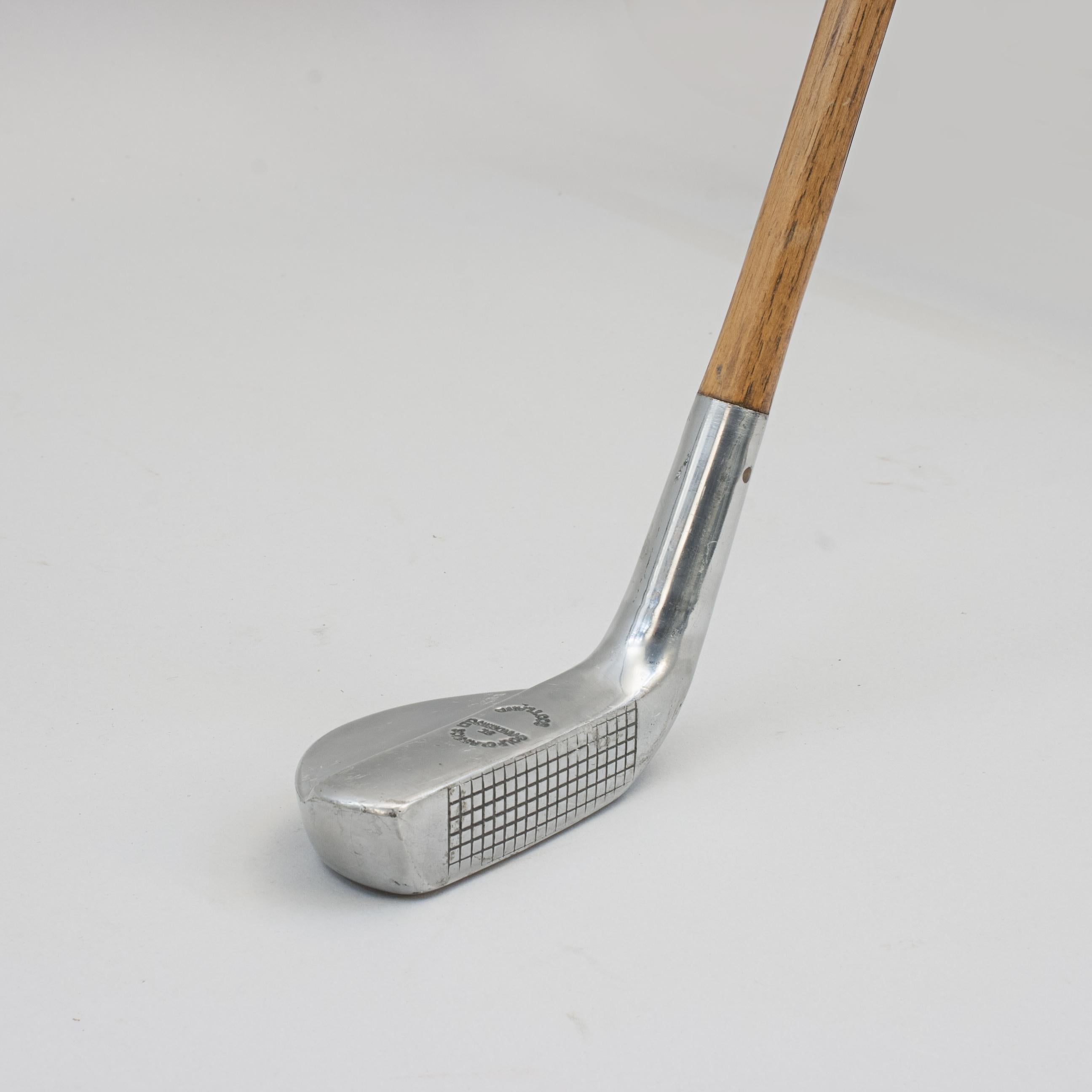 Reproduction Alloy Mills Putter.
A good clean example of an aluminium Mills putter by Golf Classics Ltd., St Andrews, Scotland. The club head with stepped crown and stamped 'Golf Classics Ltd., St Andrews, Scotland', whilst the underside is stamped