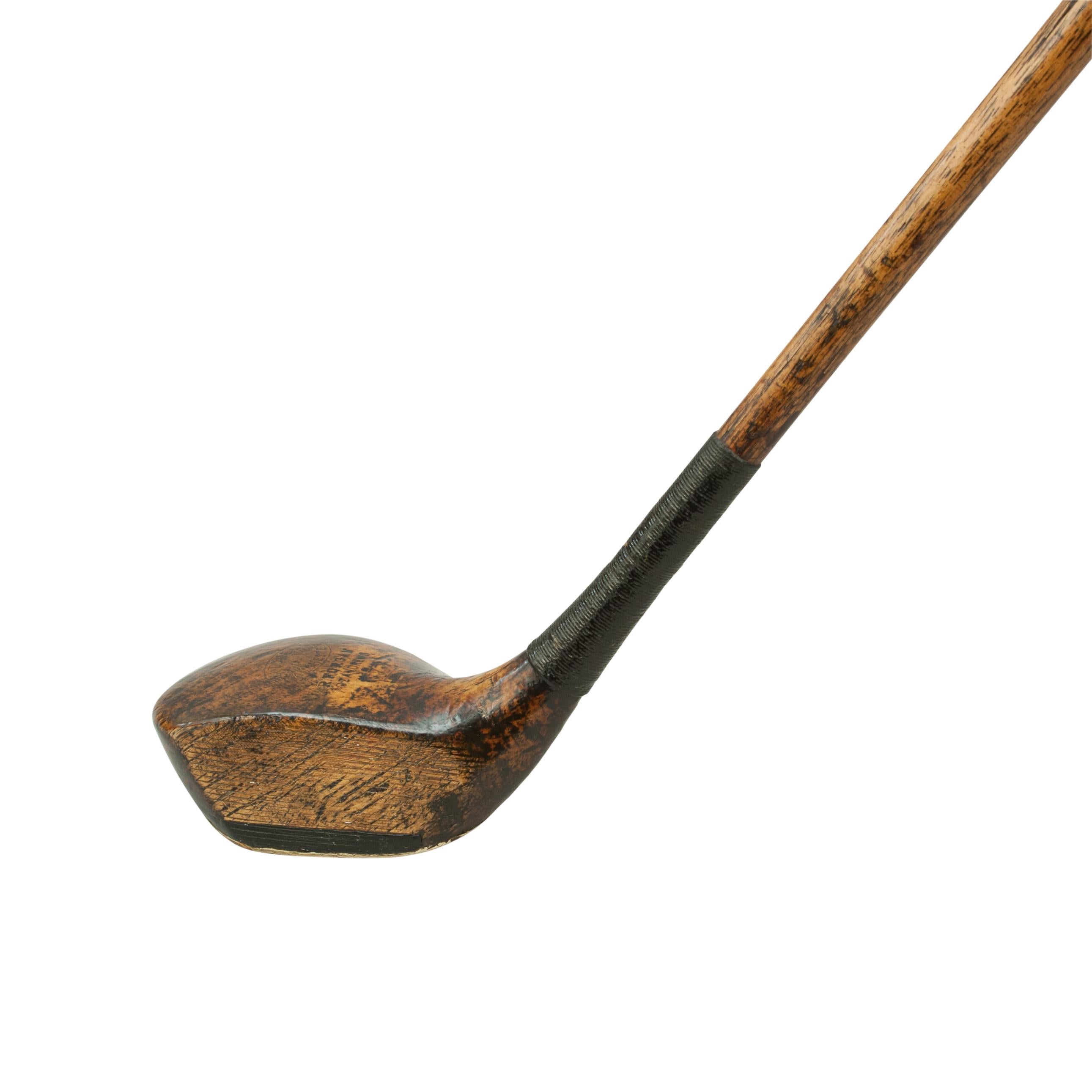 Vintage golf club, Hickory shafted Brassie, Forgan, St Andrews.
A good persimmon wood brassie by Robert Forgan & Son of St Andrews. The club has a hickory shaft with a replaced suede leather grip. The head is marked with Forgan's details with the