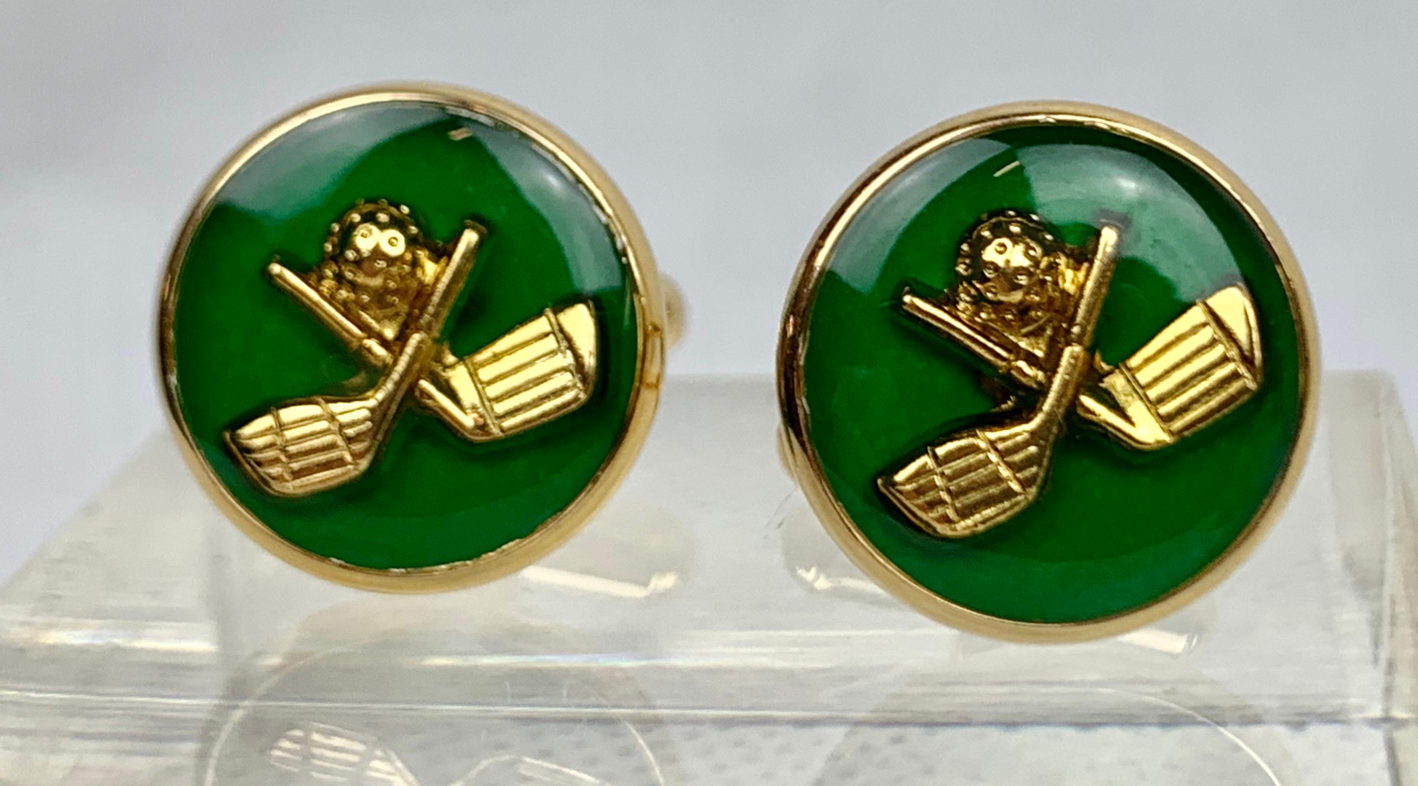 For the golfer a vintage pair of gold filled cufflinks with green enamel.  The motif is of crossed golf clubs with a golf ball.  The backs are 