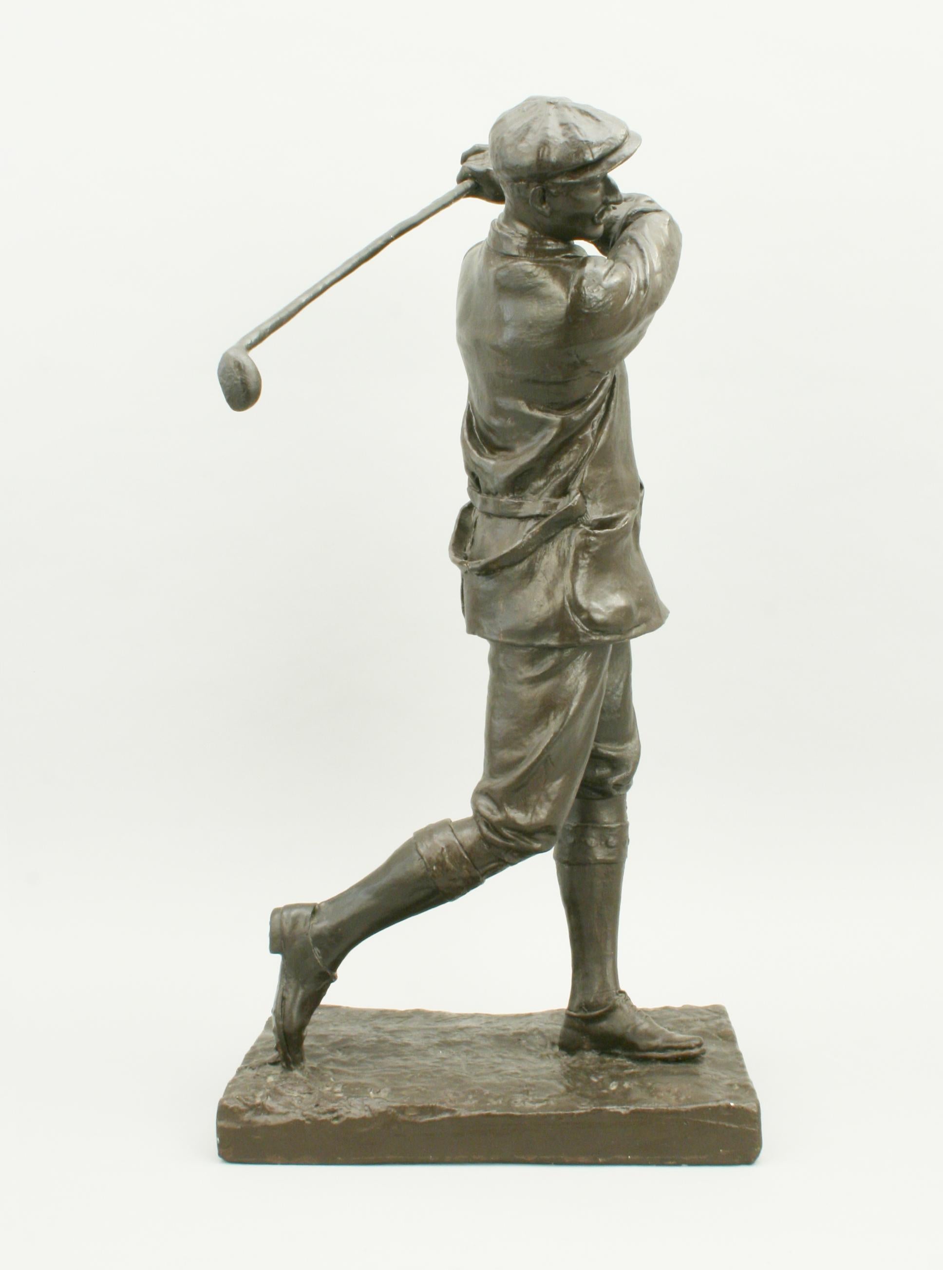 vintage golfer statue