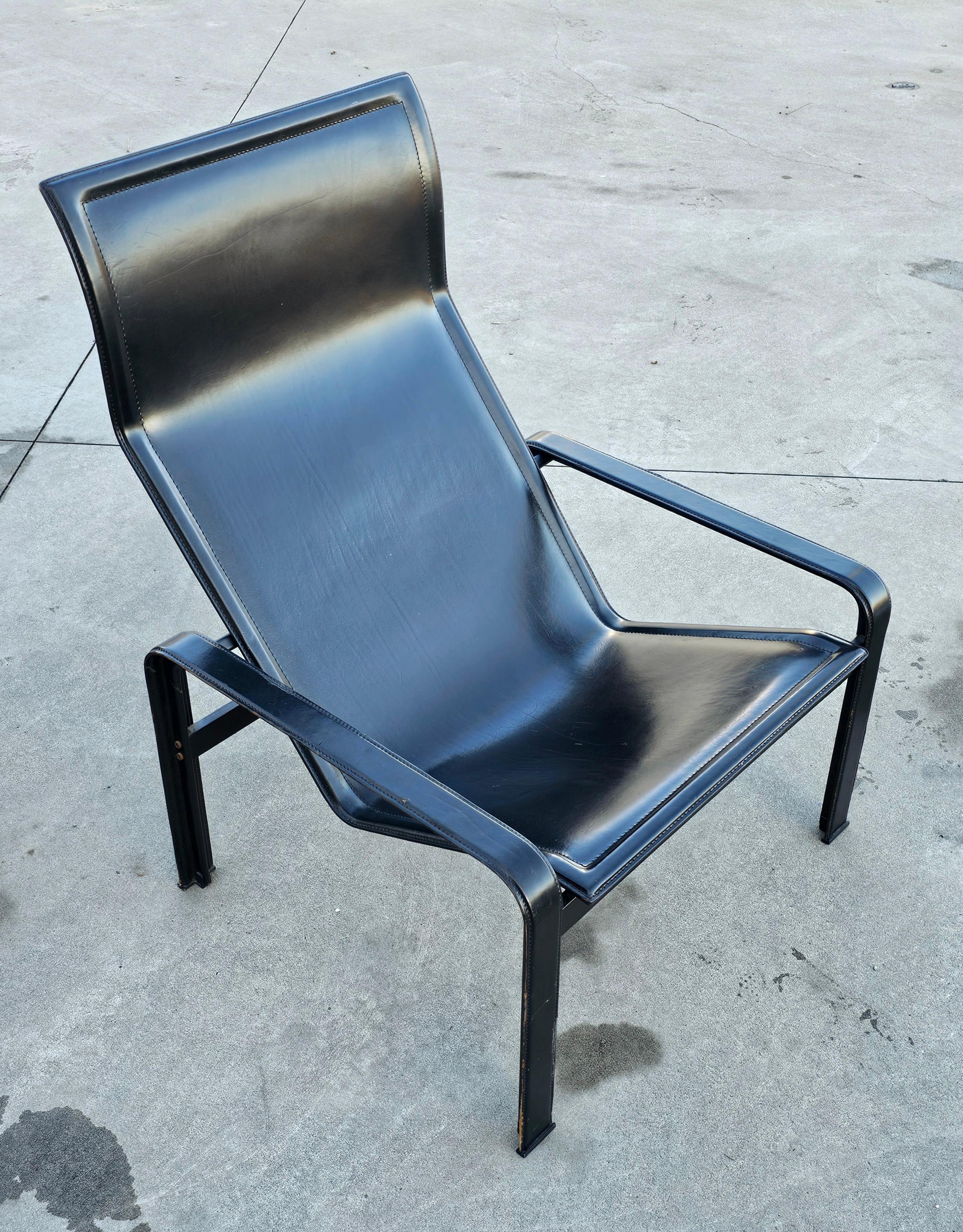 In this listing you will find a very rare Postmodern lounge chair 