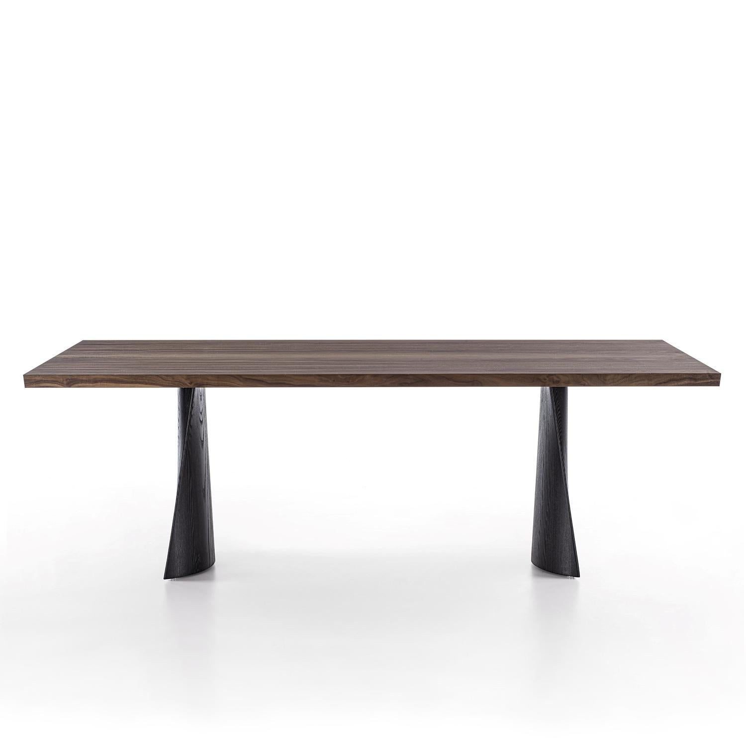 Dining Table Goma with table top in walnut 
wood with bevelled edges, with 2 feet base 
in solid wood in pigmented all black finish.
Available on request in:
L220xD100xH75cm, price: 8900,00€
L240xD100xH75cm, price: 9500,00€
L260xD100xH75cm,