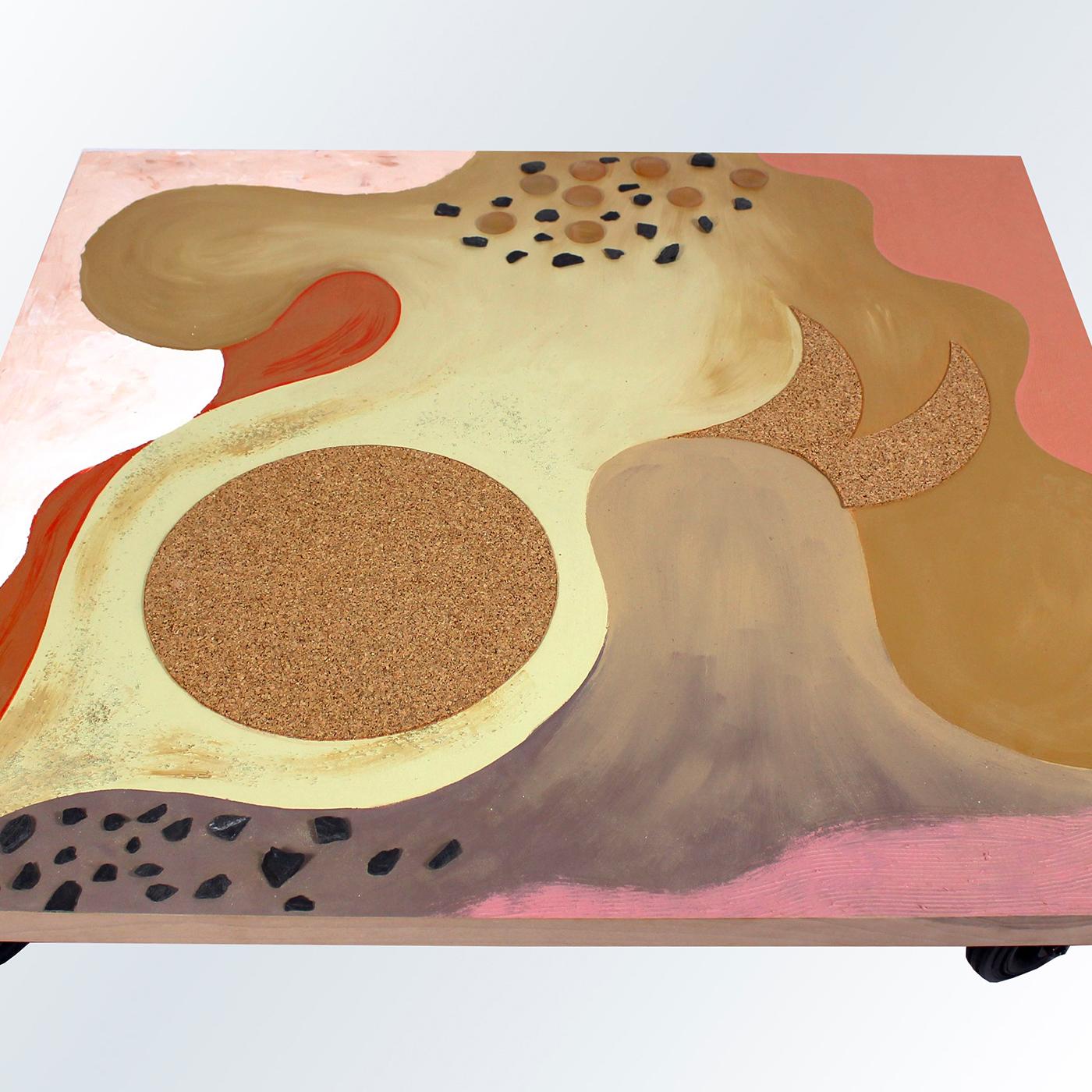 Contemporary and unique, this coffee table elevates functional decor to art with the abstract 