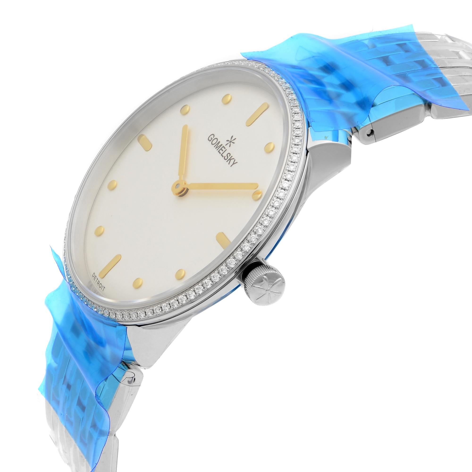 This brand new Gomelsky Audry G0120112281 is a beautiful Ladie's timepiece that is powered by quartz (battery) movement which is cased in a stainless steel case. It has a round shape face, no features dial and has hand sticks & dots style markers.
