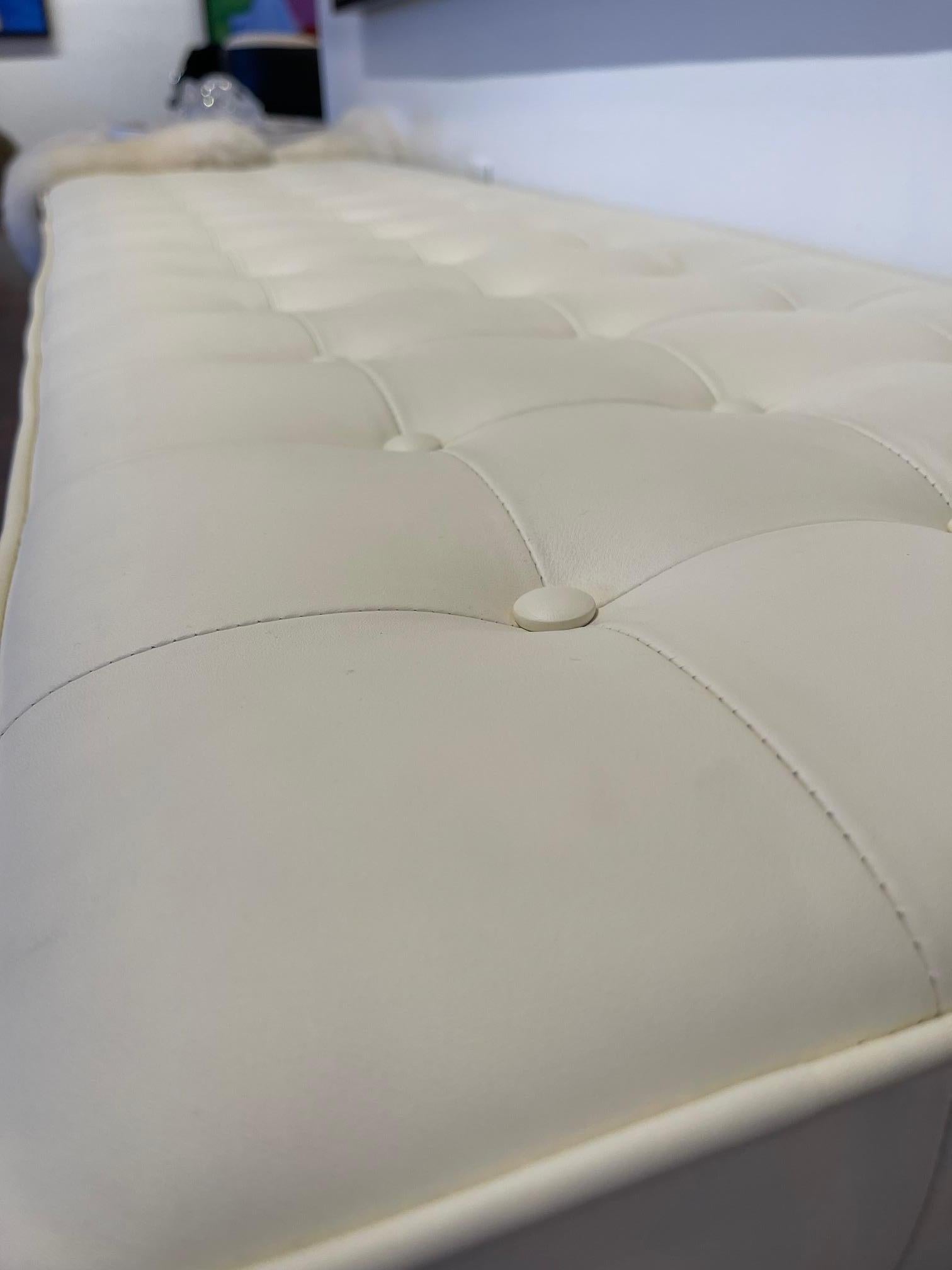 This is a custom made Modern Luxury design piece from the Gomez atelier. With lucite legs and premium foam insert this bench is made with Ivory colored Italian leather. The tufted seat adds texture and an ergonomic depth. The size and shape makes it