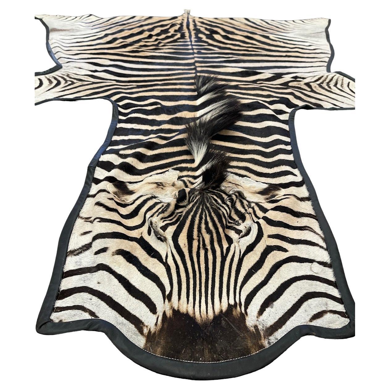 Come and browse our selection of South African Zebra Rugs. With our superb craftsmanship and quality stock, we can assure you that this stable luxury item will last for years to come. Each rug is fitted with a weighted hand-stitched lining. This