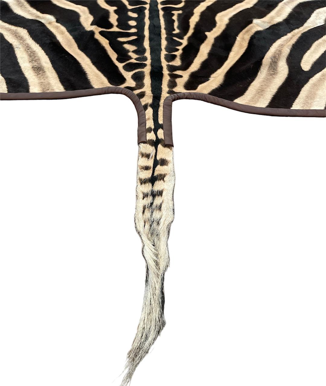 Gomez Zebra Hide Rug Trimmed in Brown Italian Leather In New Condition In Saint Louis, US
