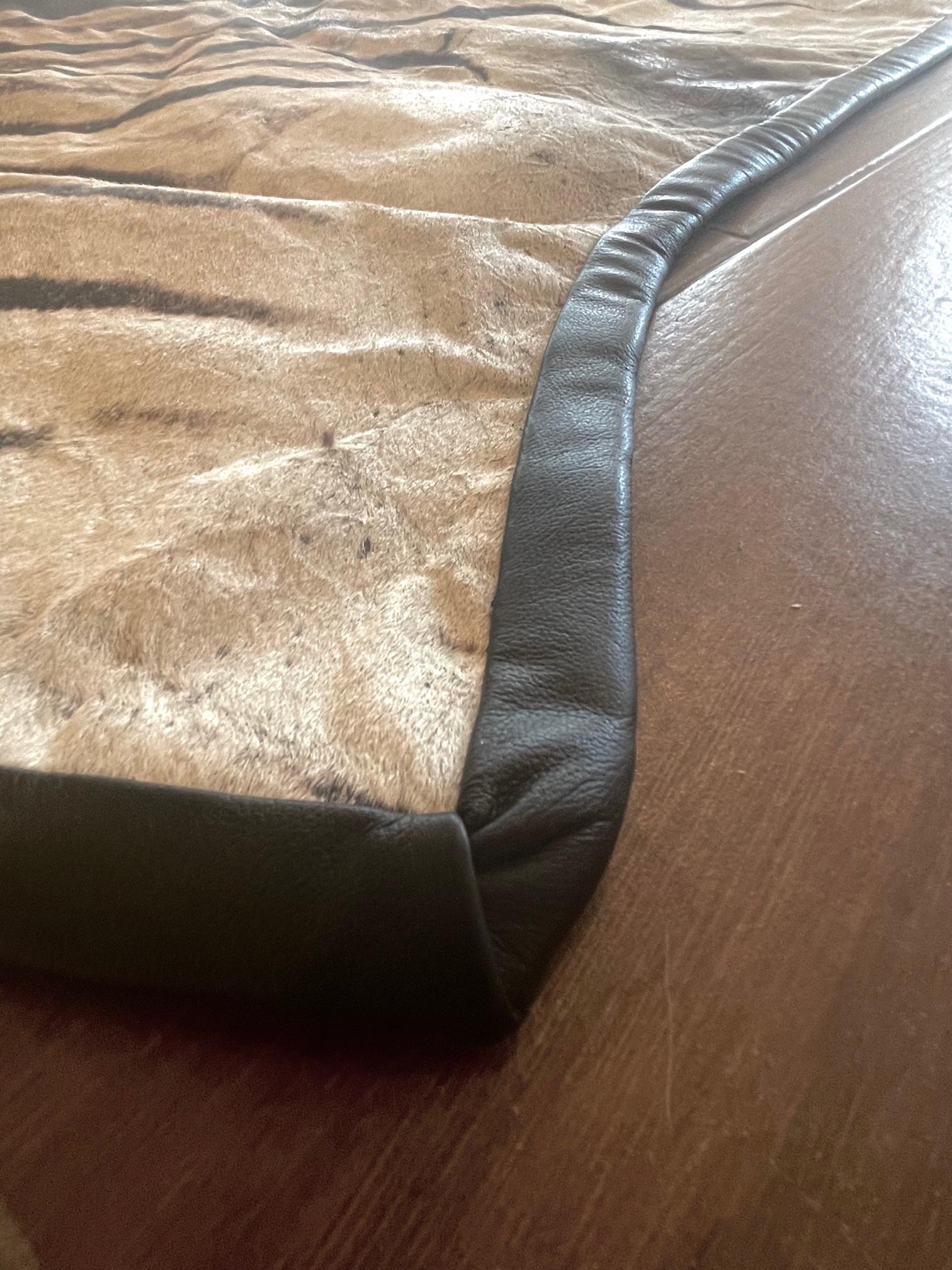 Contemporary Gomez Zebra Hide Rug Trimmed in Black Italian Leather For Sale