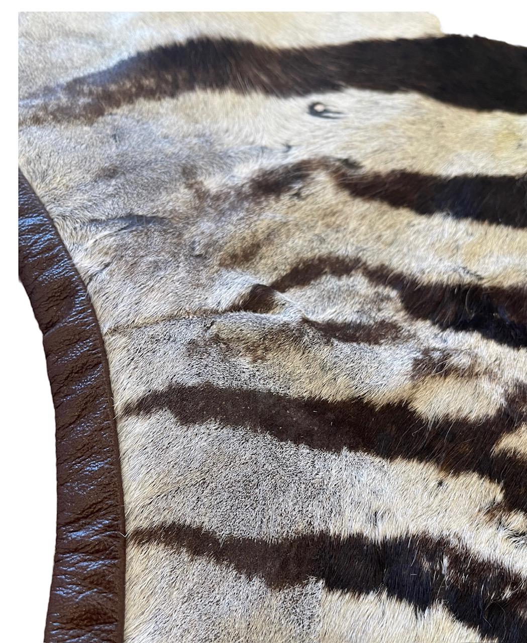 Come and browse our selection of South African Zebra Rugs. With our superb craftsmanship and quality stock, we can assure you that this stable luxury item will last for years to come. Each rug is fitted with a weighted handstitched lining. This