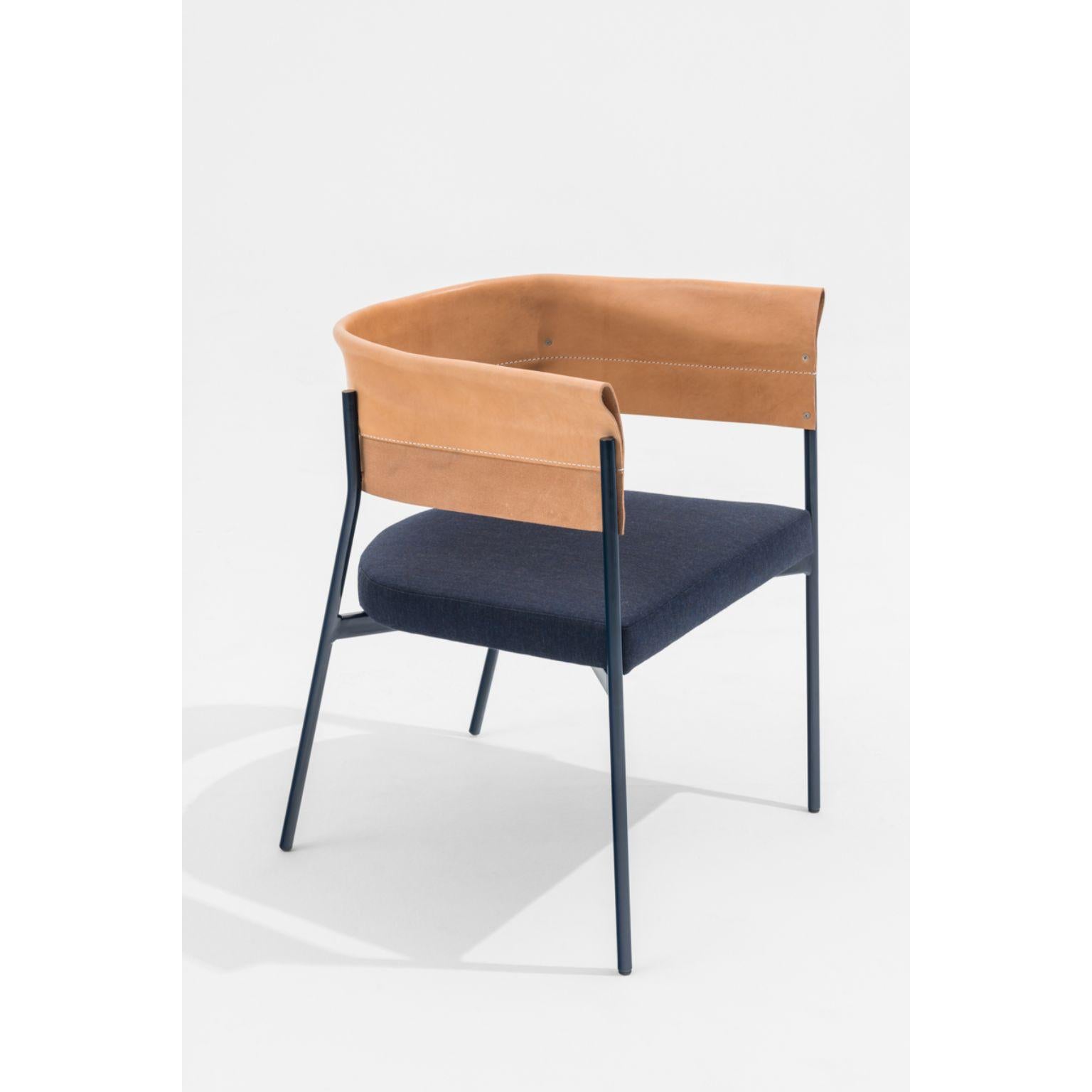 Gomito armhair by SEM
Dimensions: W61 x D50 x H72 cm
Material: Lacquered hand-welved steel frame in colours, Backrest in precious folded and sewn leather, Upholstered seat in fabric Canvas 2 by Kvadrat.
Also available in different colours.