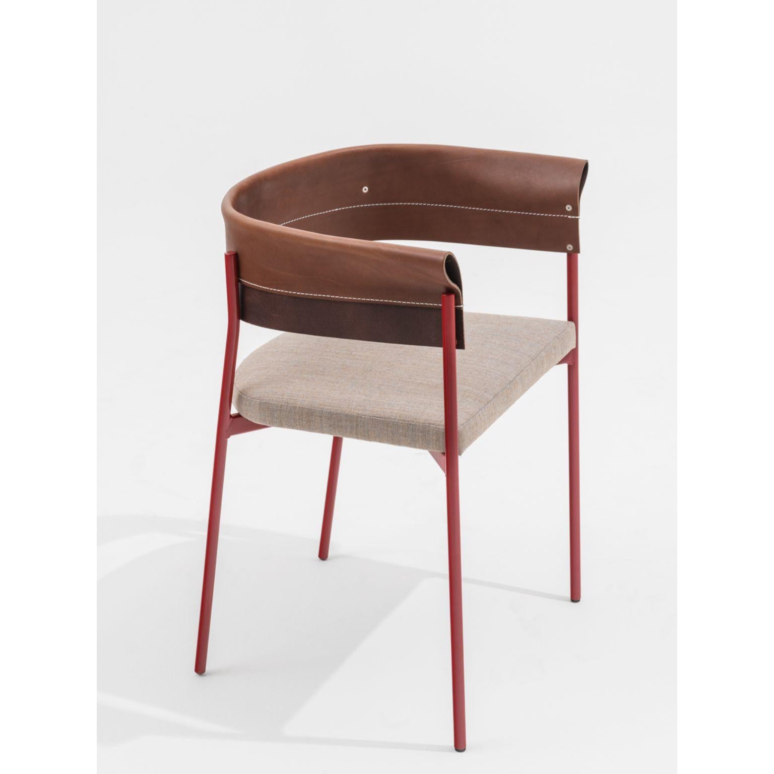 Gomito Chair by SEM
Dimensions: W54 x D45 x H75 cm
Material:Lacquered hand-welved steel frame in colours, Backrest in precious folded and sewn leather,Upholstered seat in fabric Canvas 2 by Kvadrat.
Also Available in different colours.

Gomito