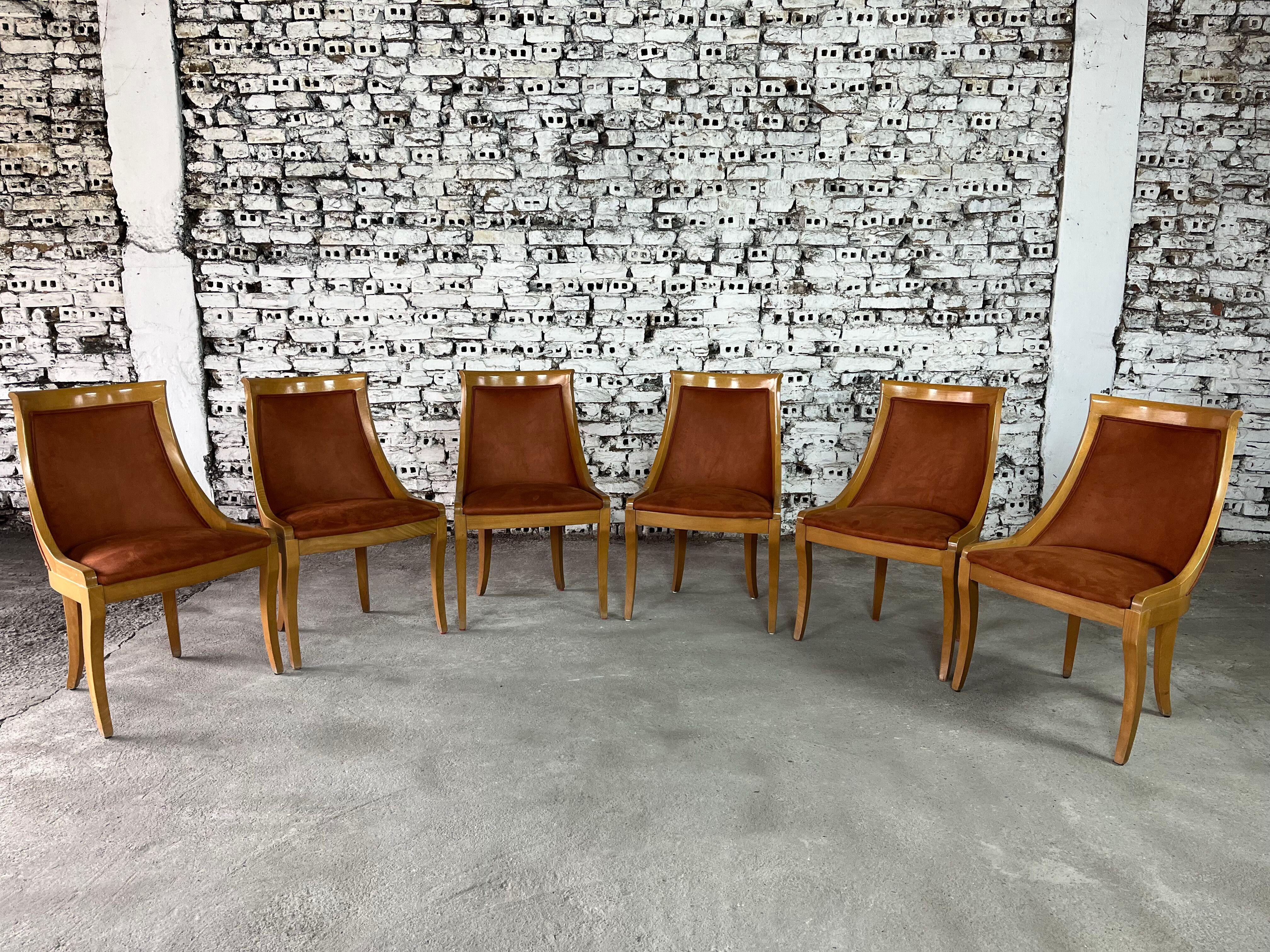 Dimensions: H 36” x W 22.5” x D 30”

Set of 6 French Vintage Gondola style dining chairs. Features solid wood construction with curved slat backs, resting on saber legs. Newly reupholstered seats in brown fabric. 
Please see our other listings for