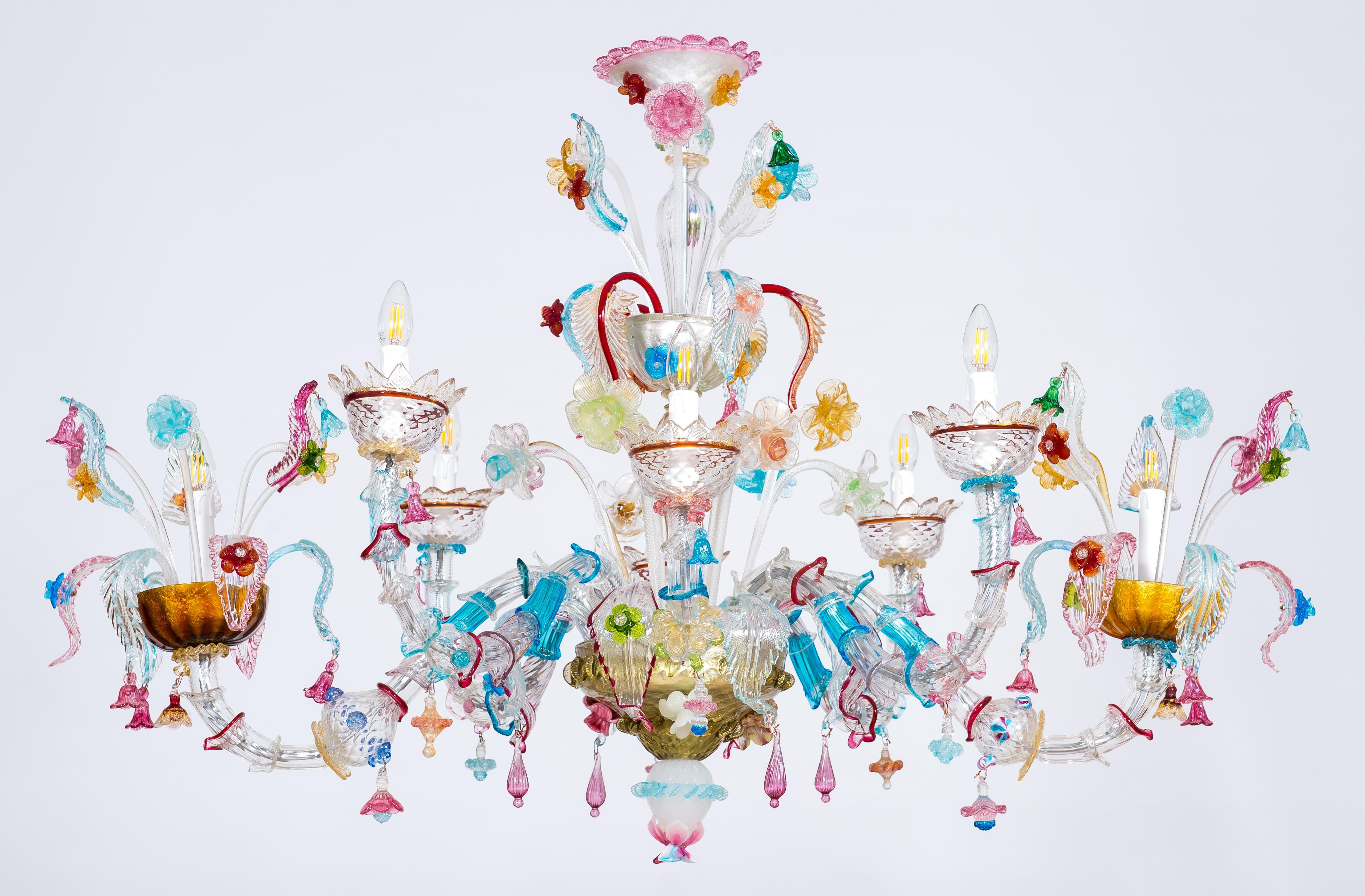 Gondola chandelier with colorful finishes in blown Murano glass, Italy 1980s by Giovanni Dalla Fina
Beautiful chandelier with an intriguing explosion of delicately colored flowers, a springtime garden in the shape of a Venetian Gondola. Eight