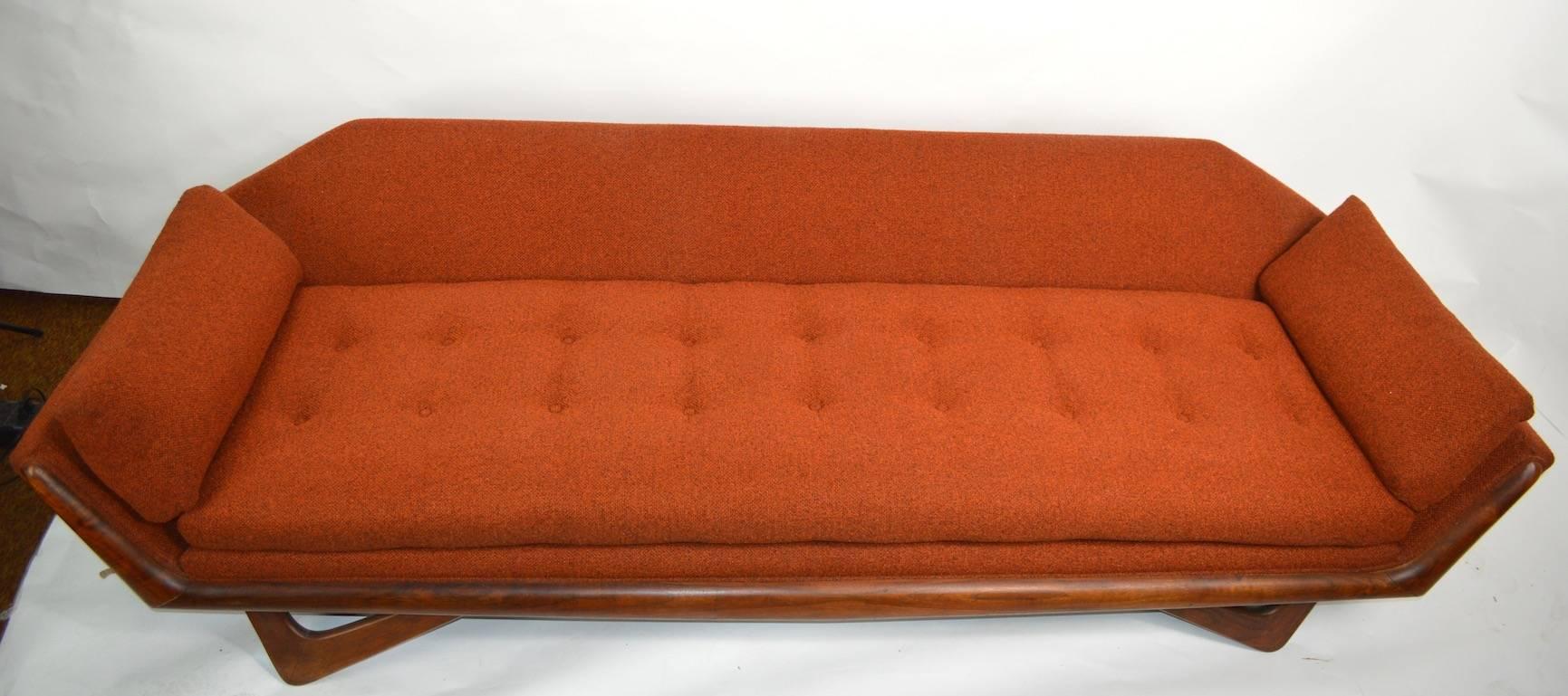 Classic Gondola sofa designed by Adrian Pearsall for Craft Associates. This example is in excellent original condition, clean and ready to use. We have shown it both with, and without the floral backrest cushions. Back cushions easily reupholstered