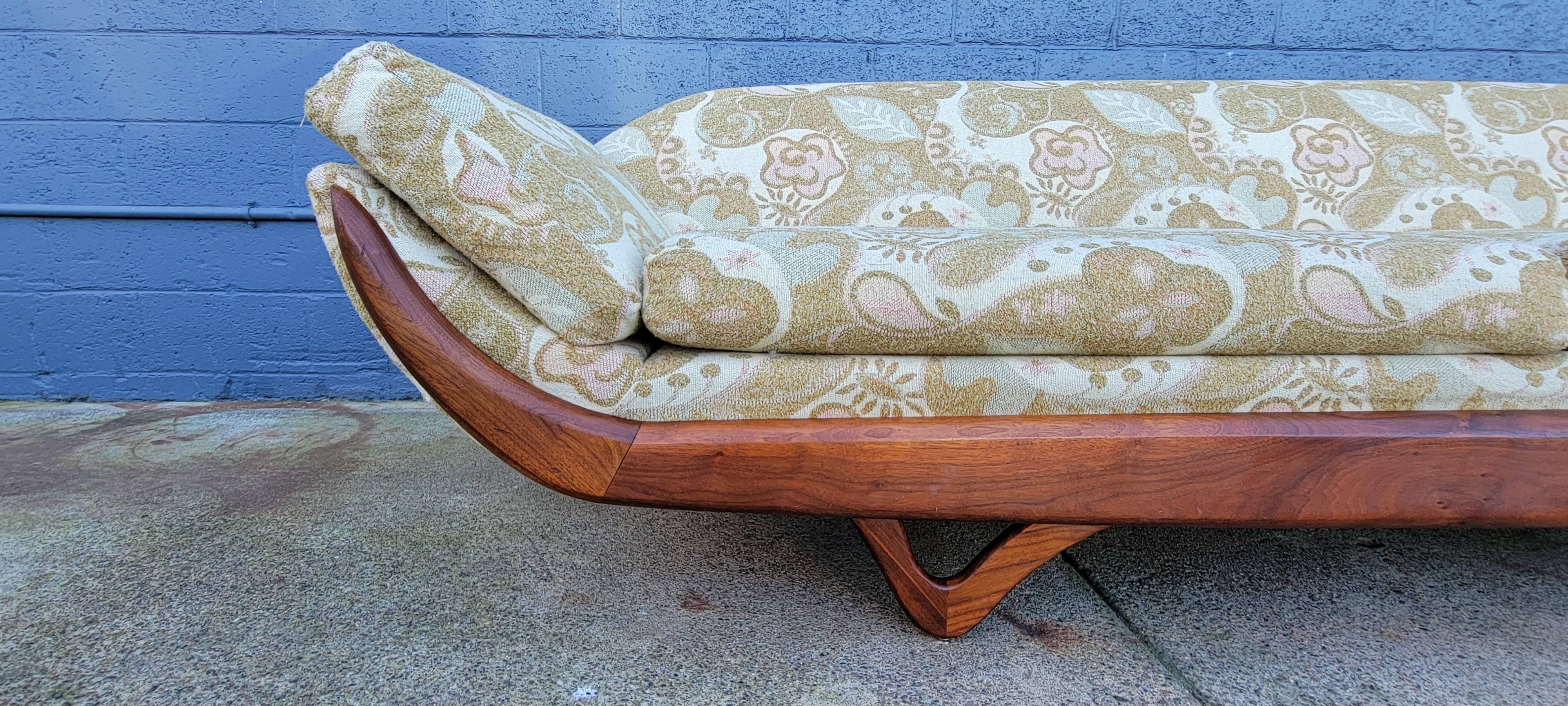 1970's Gondola sofa by Tempo Furniture. Solid walnut frame, 4 reversible cushions. Amazing original condition with very mild wear. Classic, iconic design in the style of Adrian Pearsall. Measures 100.5 inches wide.