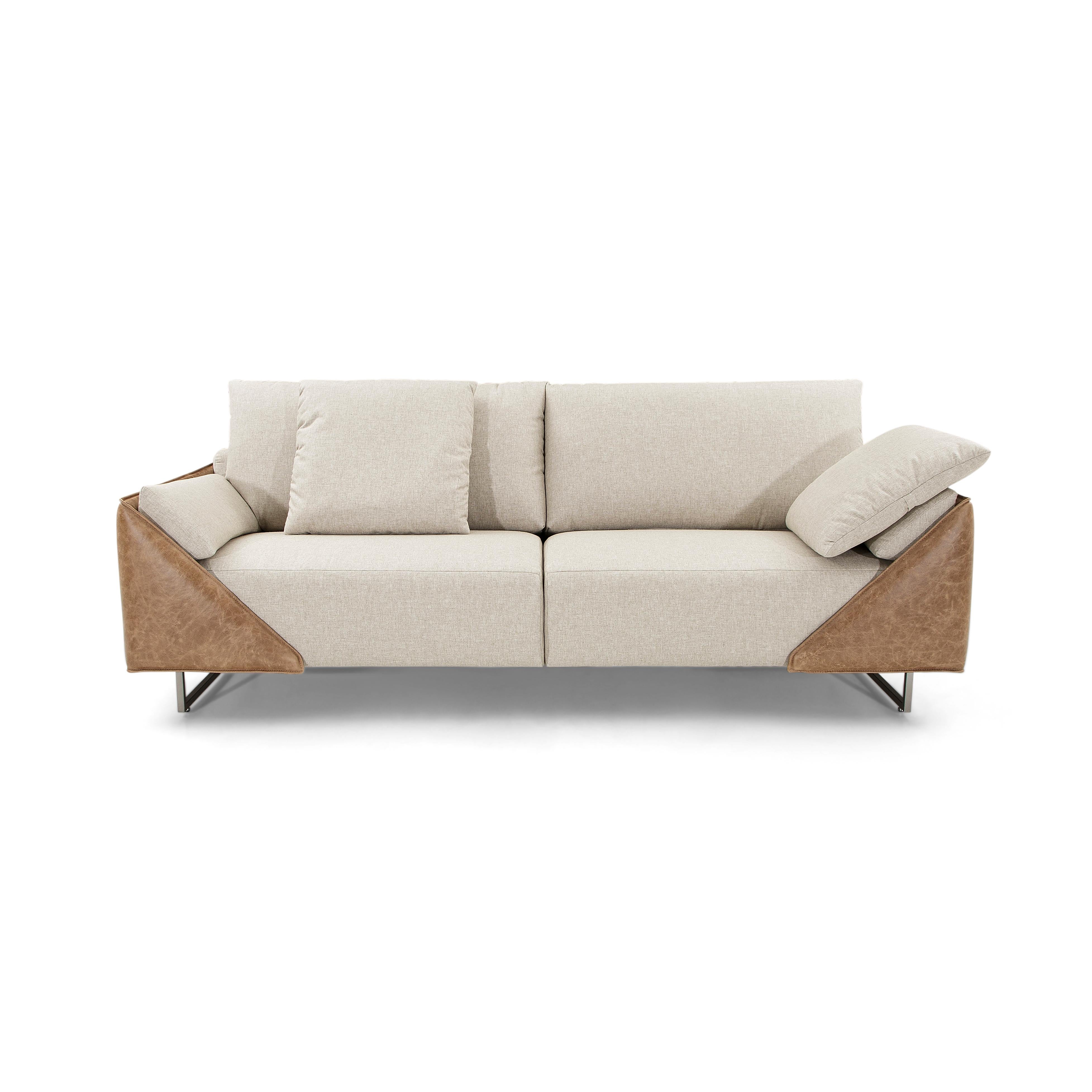 The Gondole contemporary sofa upholstered in a stunning beige fabric and its arms in brown leather, is the perfect combination for your living room. As relaxing as it looks, the actual seat is even better. This sofa is the perfect complement to a