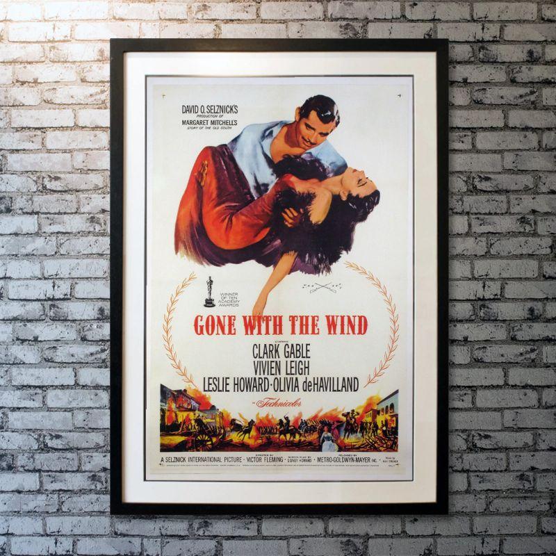 Gone With The Wind, Unframed Poster, 1961

Original US One Sheet (27 X 41 Inches). Clark Gable, Vivien Leigh, and Leslie Howard star in the David O. Selznick production of one of the grandest and most recognized films ever made. The movie was so