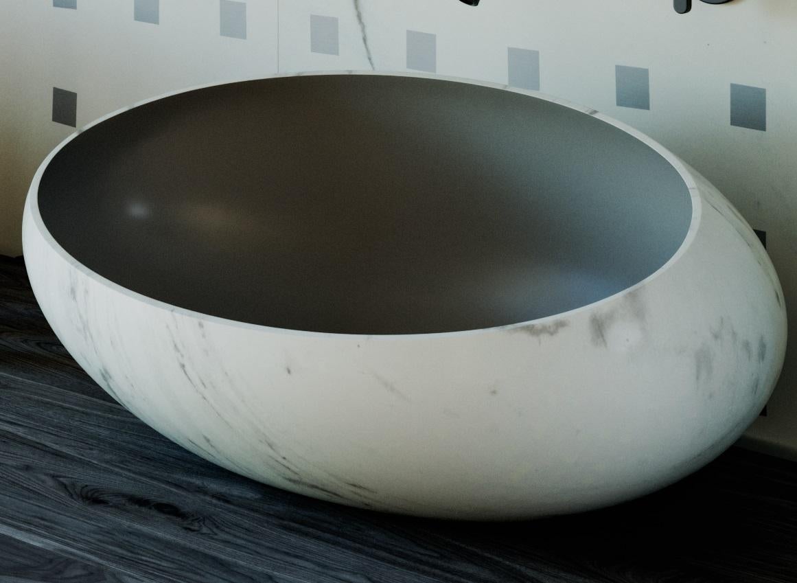 Grand bassin Gong de Kreoo 
Design/One par Christophe Pillet
Dimensions : D 50 x L 80 x H 33 cm.
MATERIAL : Marbre Bianco Del Re et feuille d'argent.
Poids : 60 kg.

Disponible en différentes options de marbre et de travertin. Disponible en deux