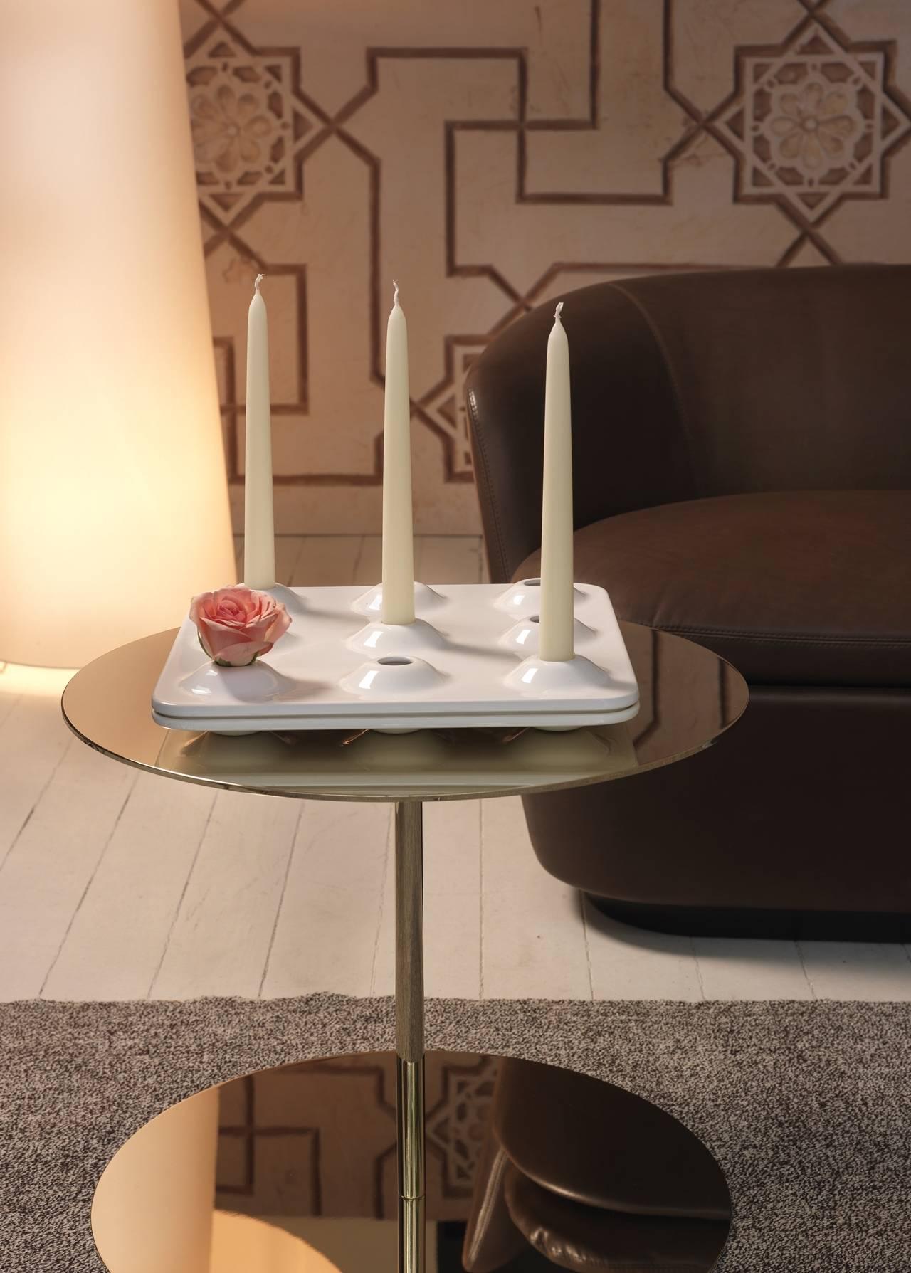 With two circular plains connected by a thin cylindrical column, this luxurious low table reflects a beautiful play of balance. Its versatility allows one to use as a
Stand-alone coffee table or group two or three as a coffee table.