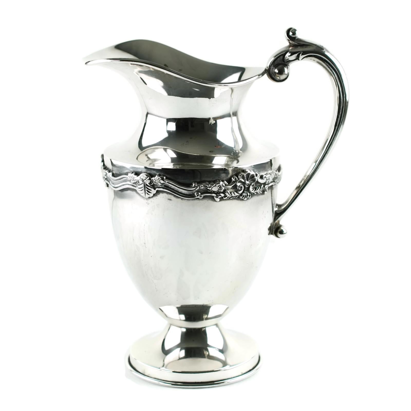 This substantial sterling silver tea set was made by highly regarded Mexico City silversmith Gonzalo W. Moreno. Moreno's taller produced lines of hollowware and jewelry, some of which was retailed by Cartier. This elegant signed Moreno set is
