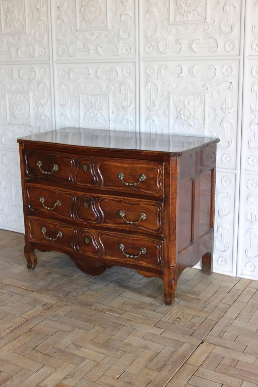 An 18th century late Louis XV walnut three drawer commode of elegant proportions and lovely color. 

France, circa 1770.
 