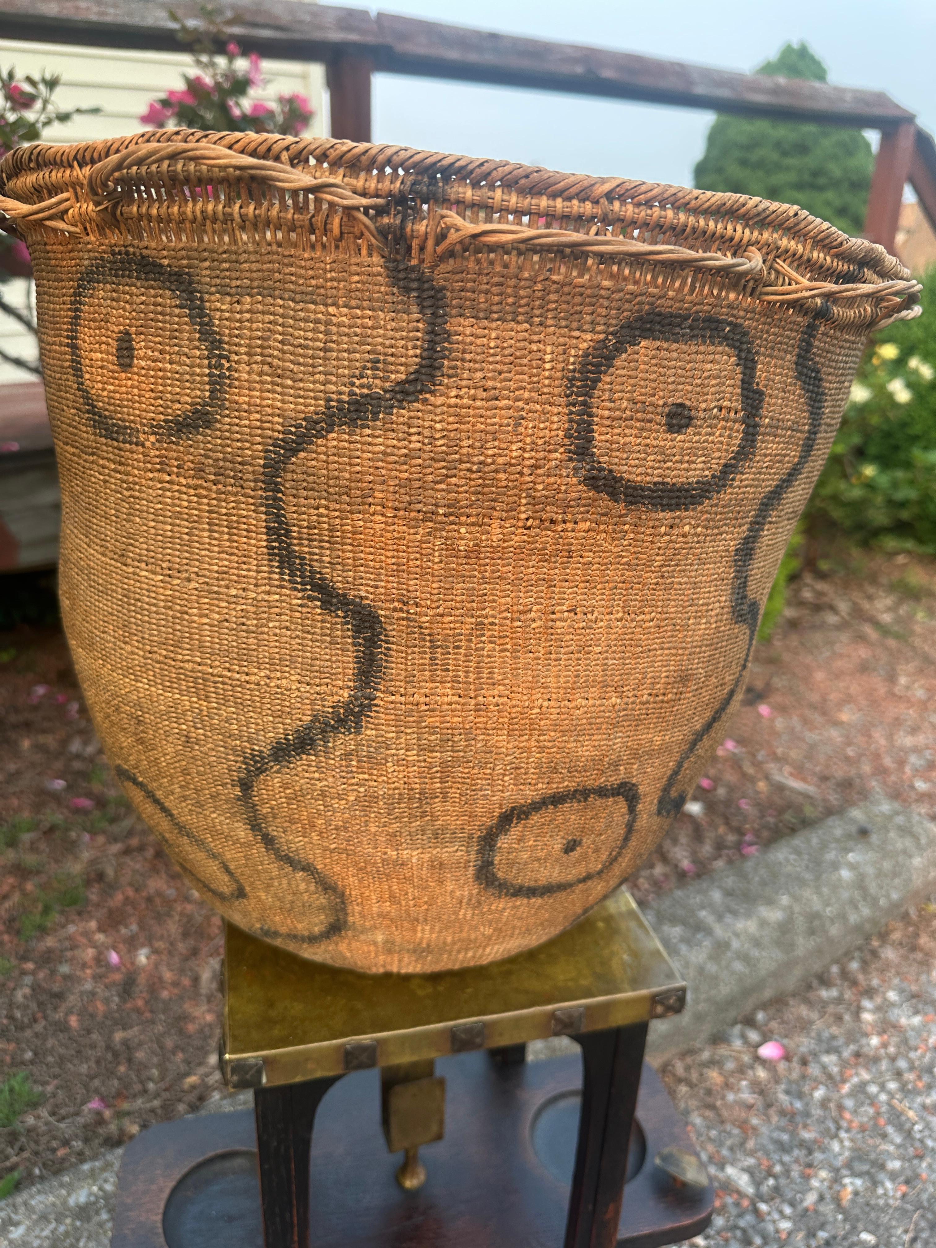 Antique Large Native American Basket - W7570

This is a great Native American basket in very good condition. It is a very attractive, large basket with no damage. The person we bought this from thought it was made in the 19th century. With an