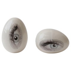 Good eye sculpture, Pair of 2 . One standing and one lying down