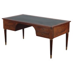 Used Good French crotch mahogany late 19th Century leather top desk having round legs