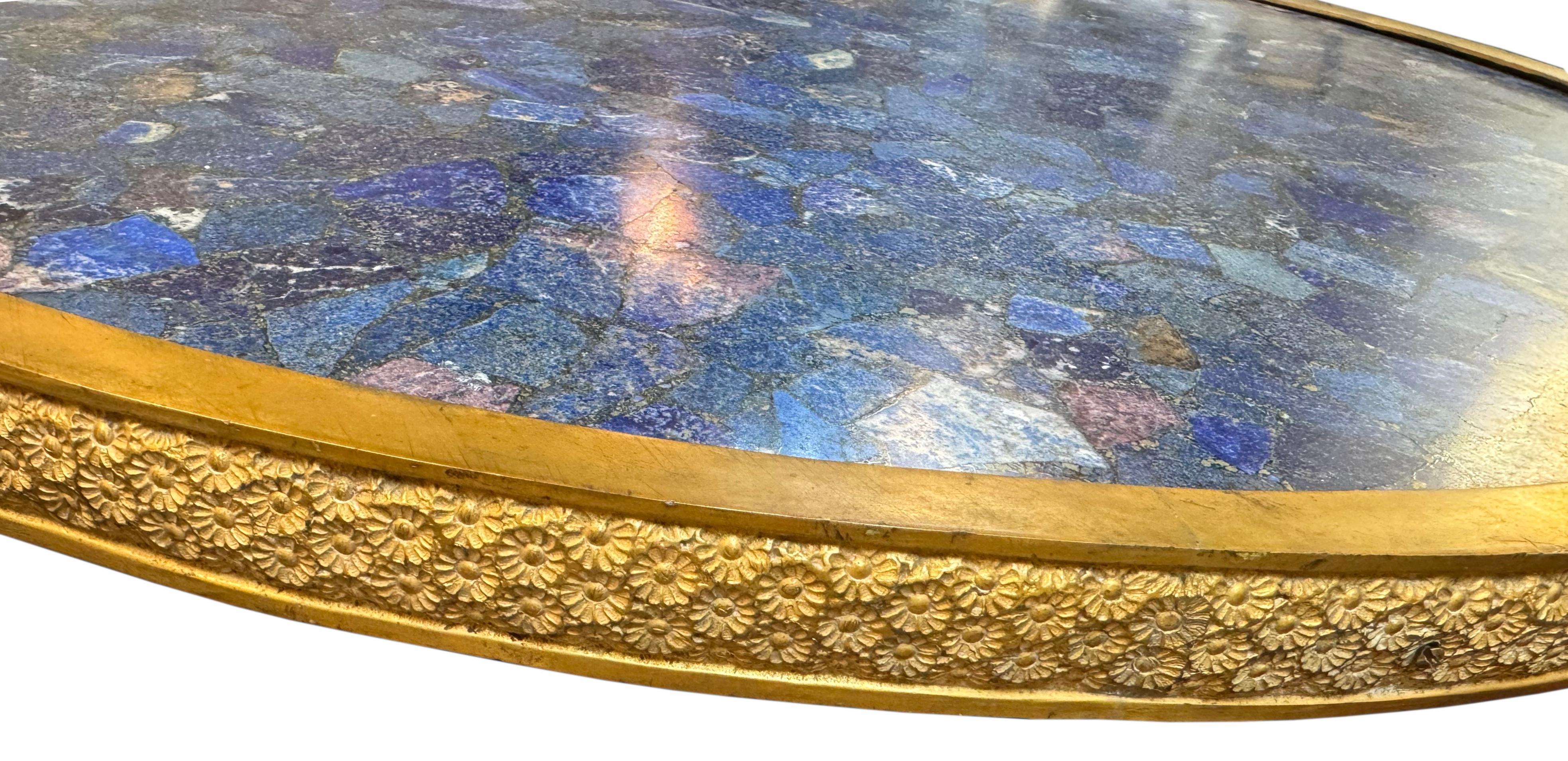 
Good French Ormolu Mounted Circular Lapis Lazuli Table Top
The well pieced lapis top within a rim of flowerhead cast gilt bronze.
Diameter. 32 in., Depth of top 1.5 in.
Condition Report
Overall good condition.