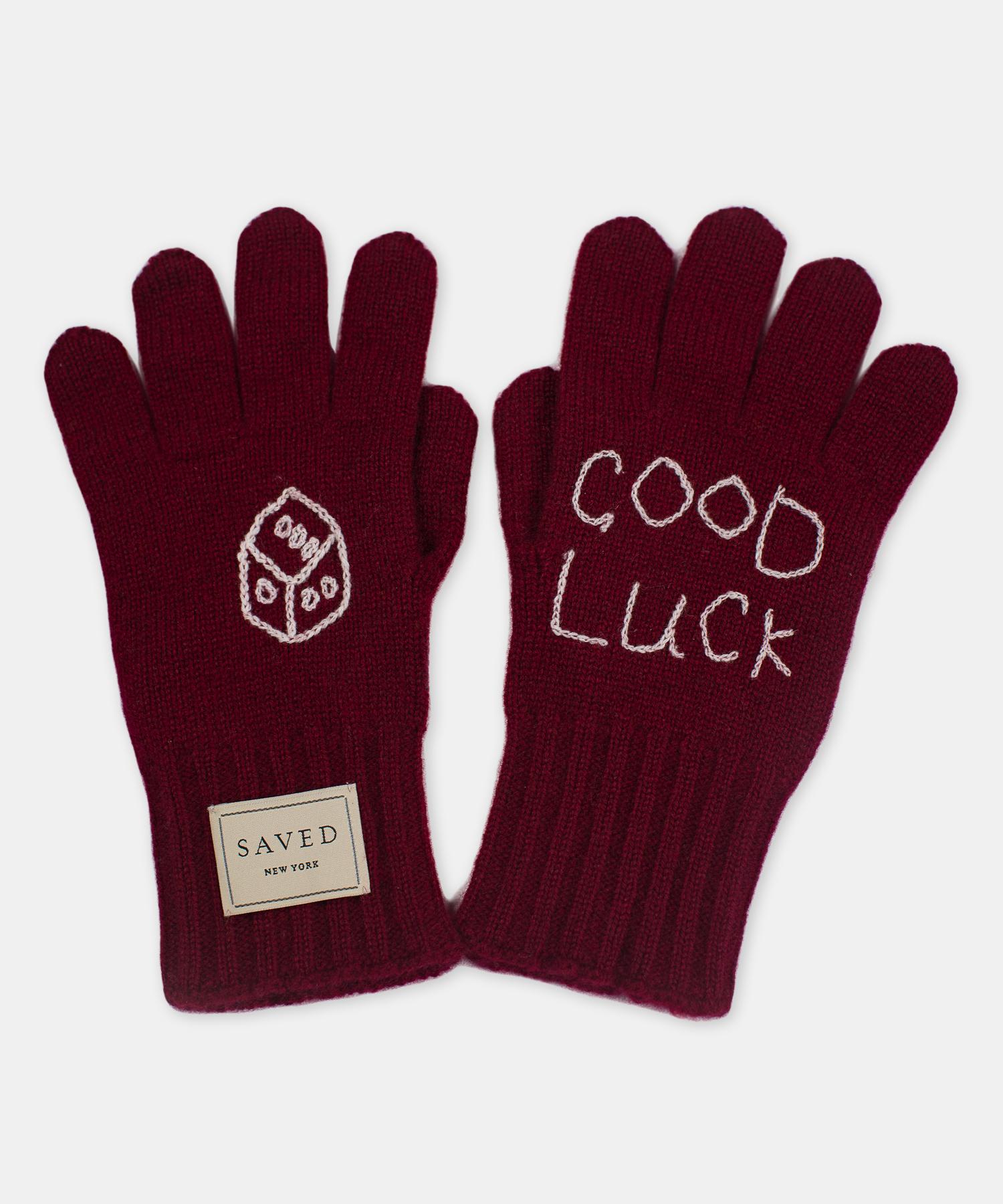 Good Luck Cashmere gloves by Saved, New York.

100% Cashmere. Includes contrasting hand embroidery details. One size.