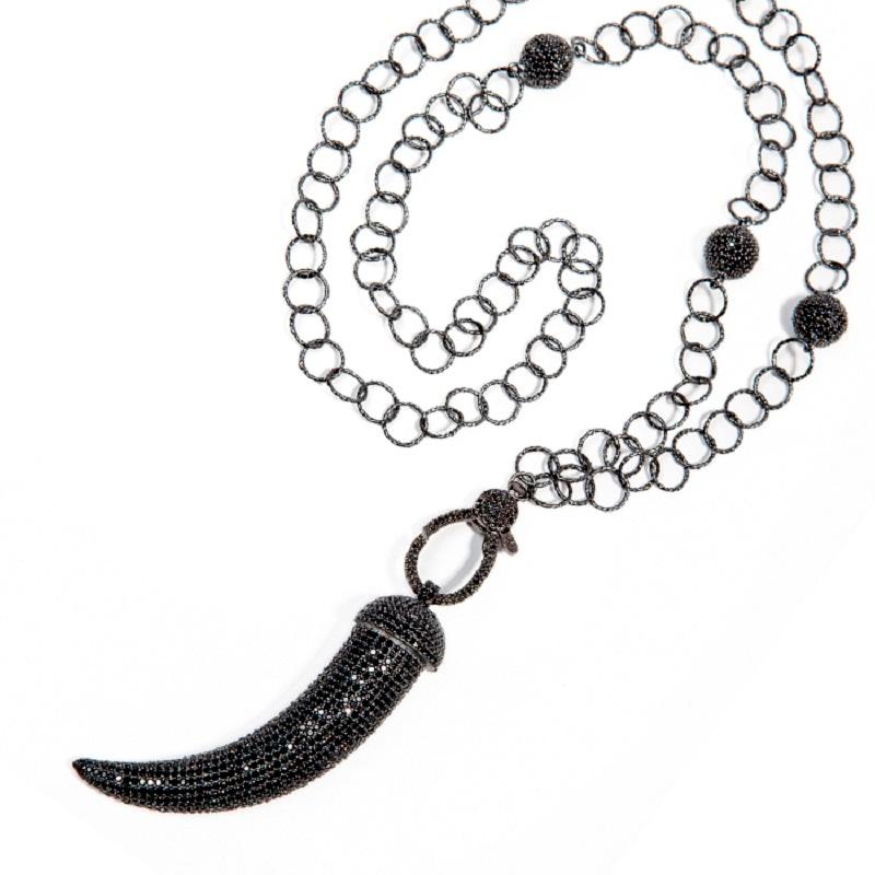The horn amulet is for good luck and protection. Platinum and grey or black rhodium plated sterling silver necklace hand crafted with hand set clear cubic zircon
60