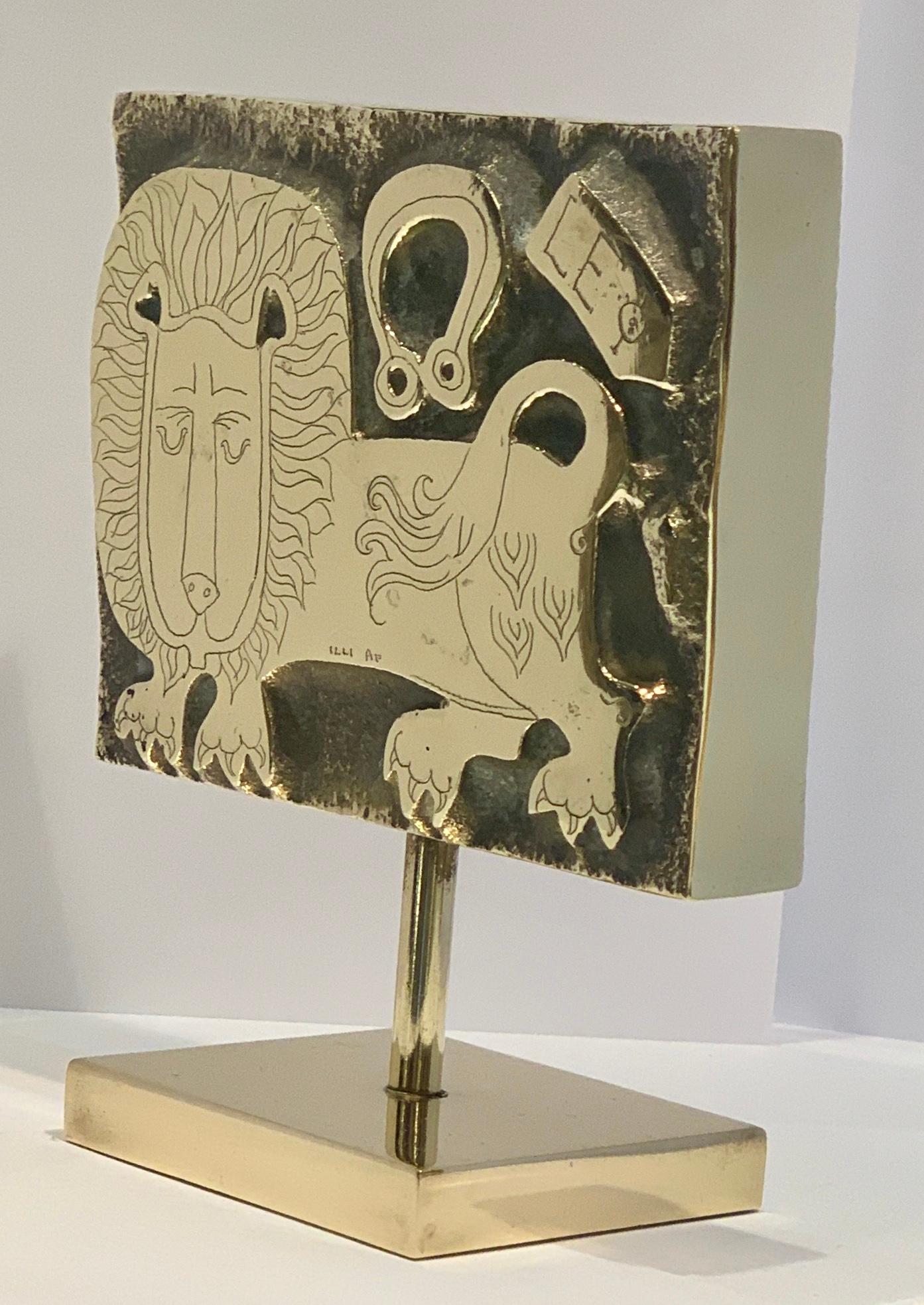 
The perfect gift for the Leo in your life! Richly textural, hand tooled high relief solid heavy brass rectangular block stamp sculpture from the 1960s features a highly polished lion, a good luck horseshoe and the word, “LEO” depicted in the