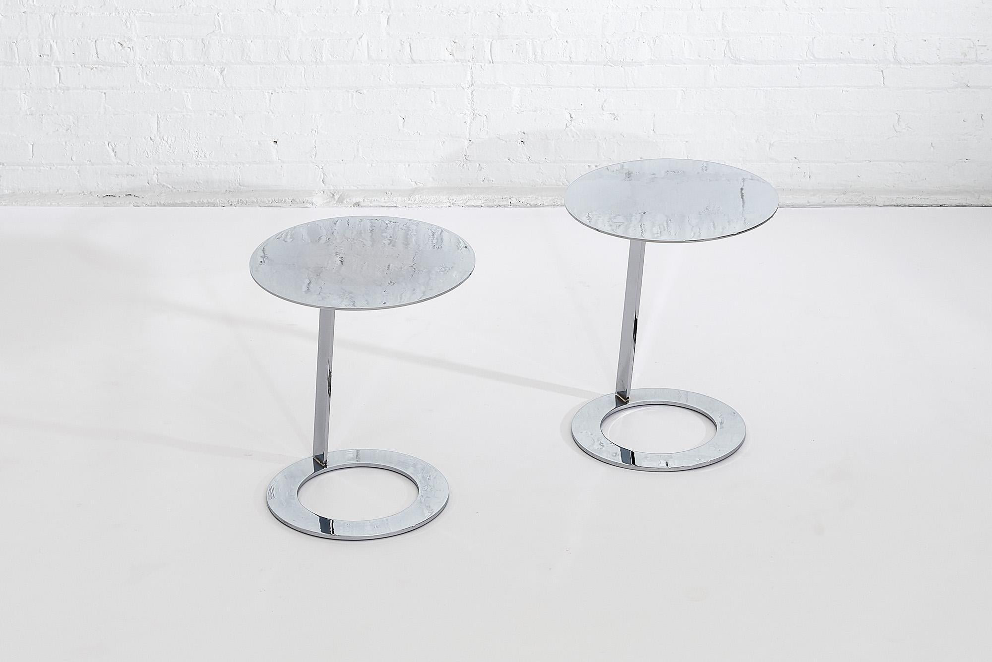 Good morning pedestal tables by Ligne Roset. Minimalist form from polished steel.