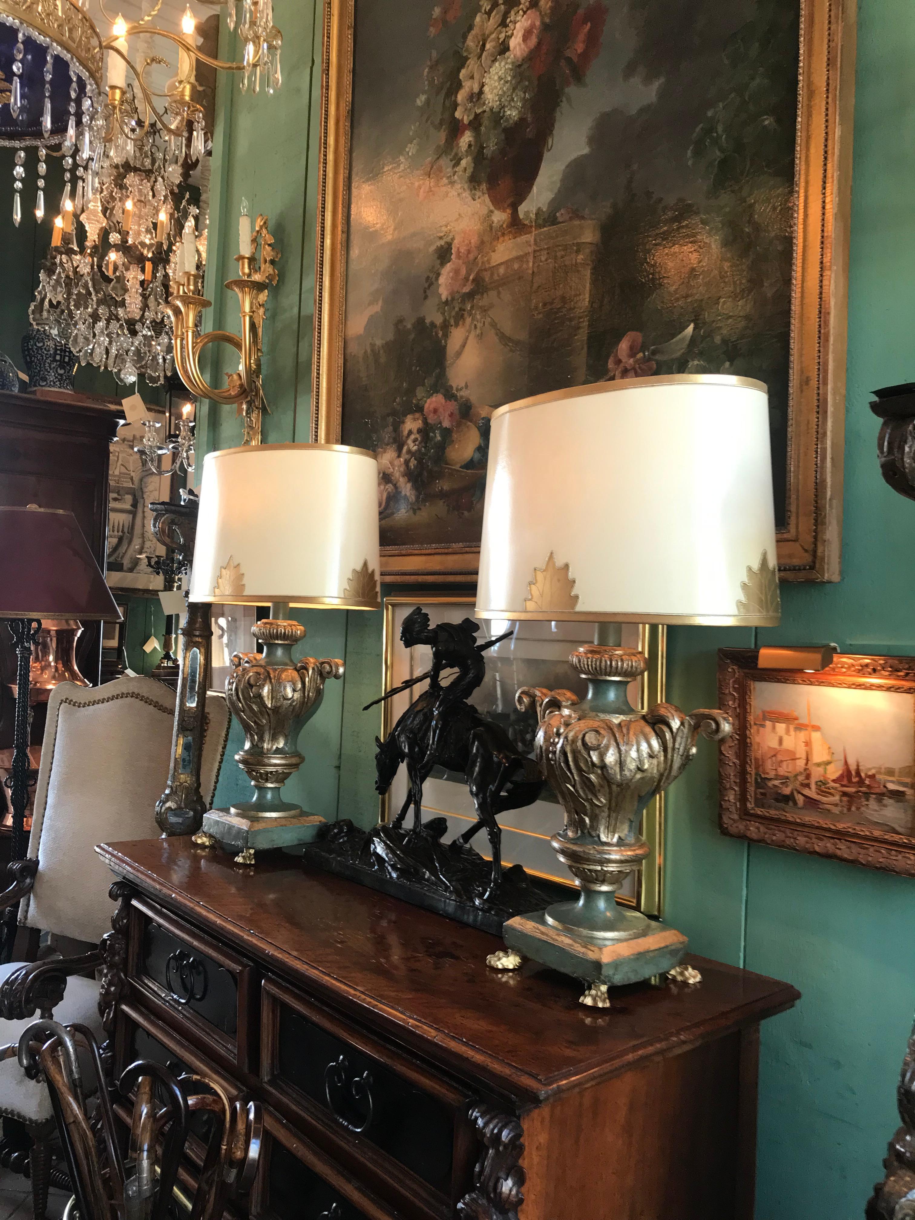 Pair table lamps antique Venetian carved wood urns gilt green / shades & finial . Elegant and rare Italian pair 18th century carved wood silvered and polychrome Venetian urns made into Lamps . Vase form Urn with Handles and Sculpted acanthus leaves