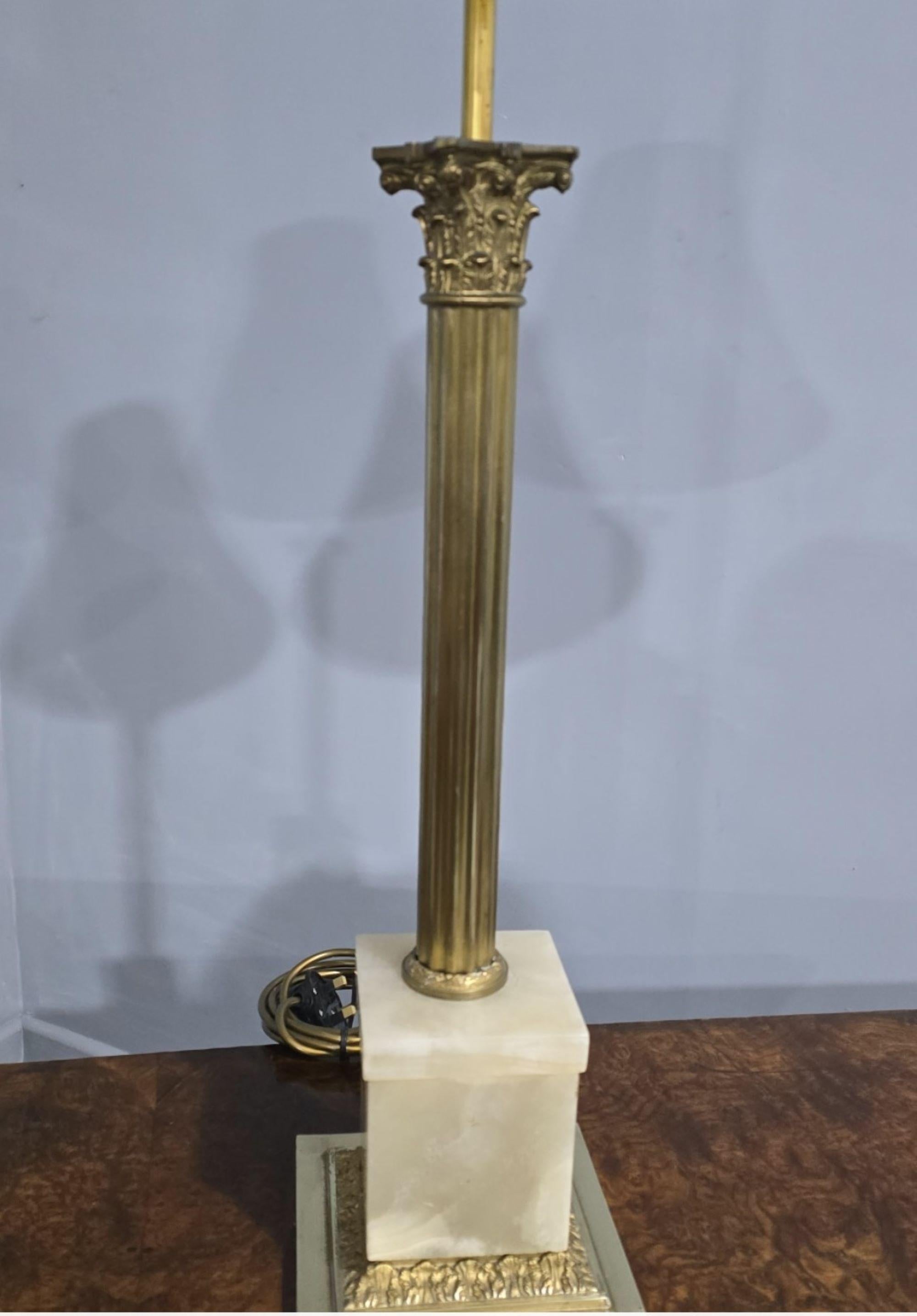 A very nice pair of brass column lamps with marble bases, rewired and ready to use. In overall very good condition.

26
