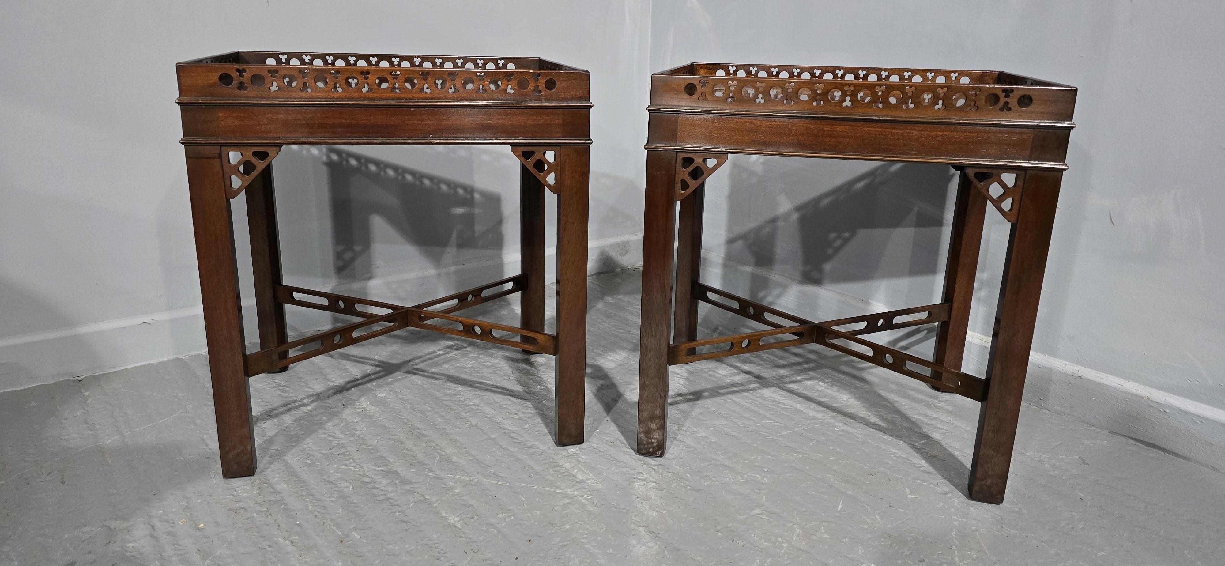 A very nice pair of pierced top and stretcher flame mahogany end or lamp tables, in very nice overall condition.

24.5