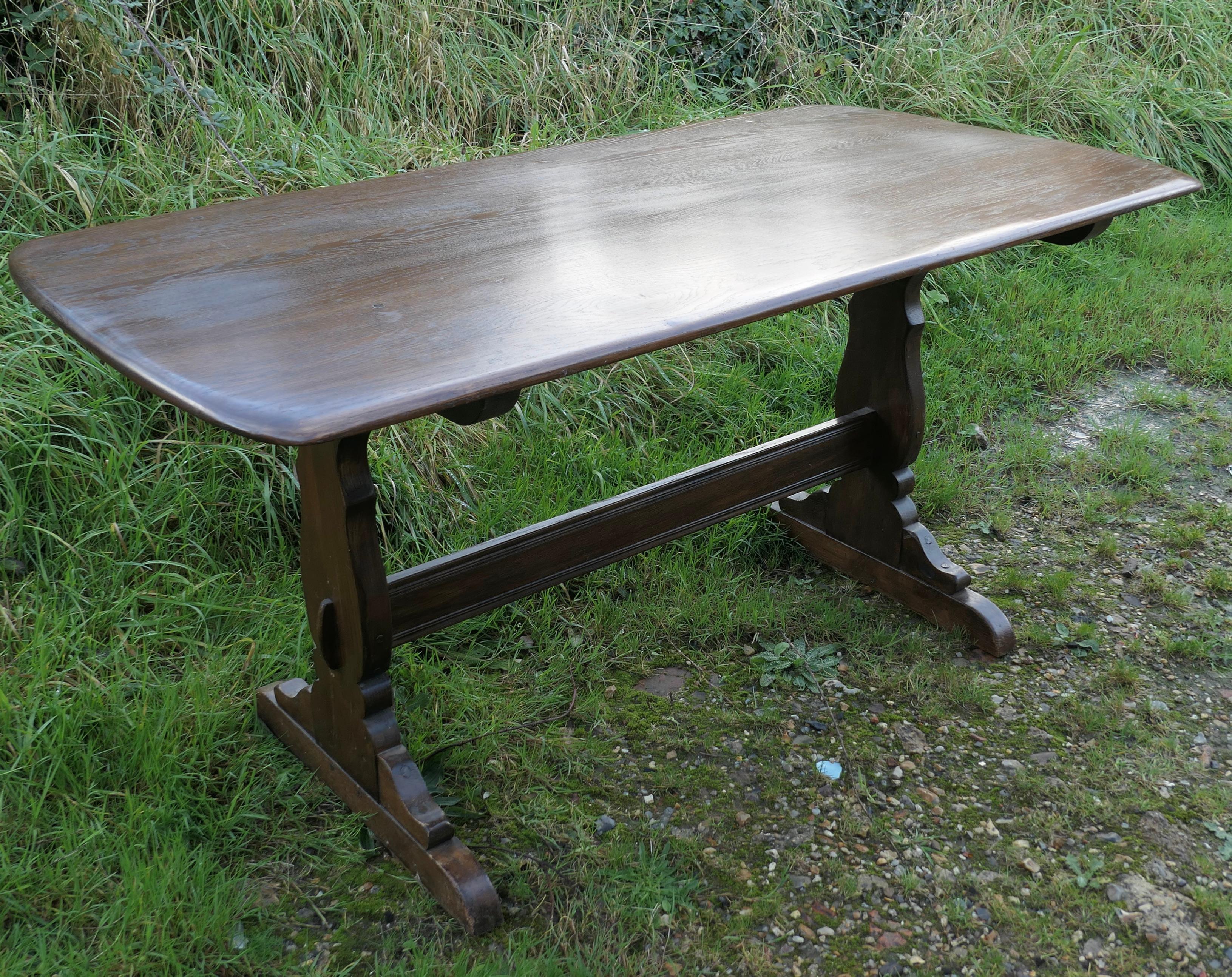 Good Quality Elm Refectory Dining Table

This is a Superb piece it is a good quality Country Elm Table in the refectory style, the table top has a curved edge with a slight boat shape to the top. The legs are chunky in the refectory style with a