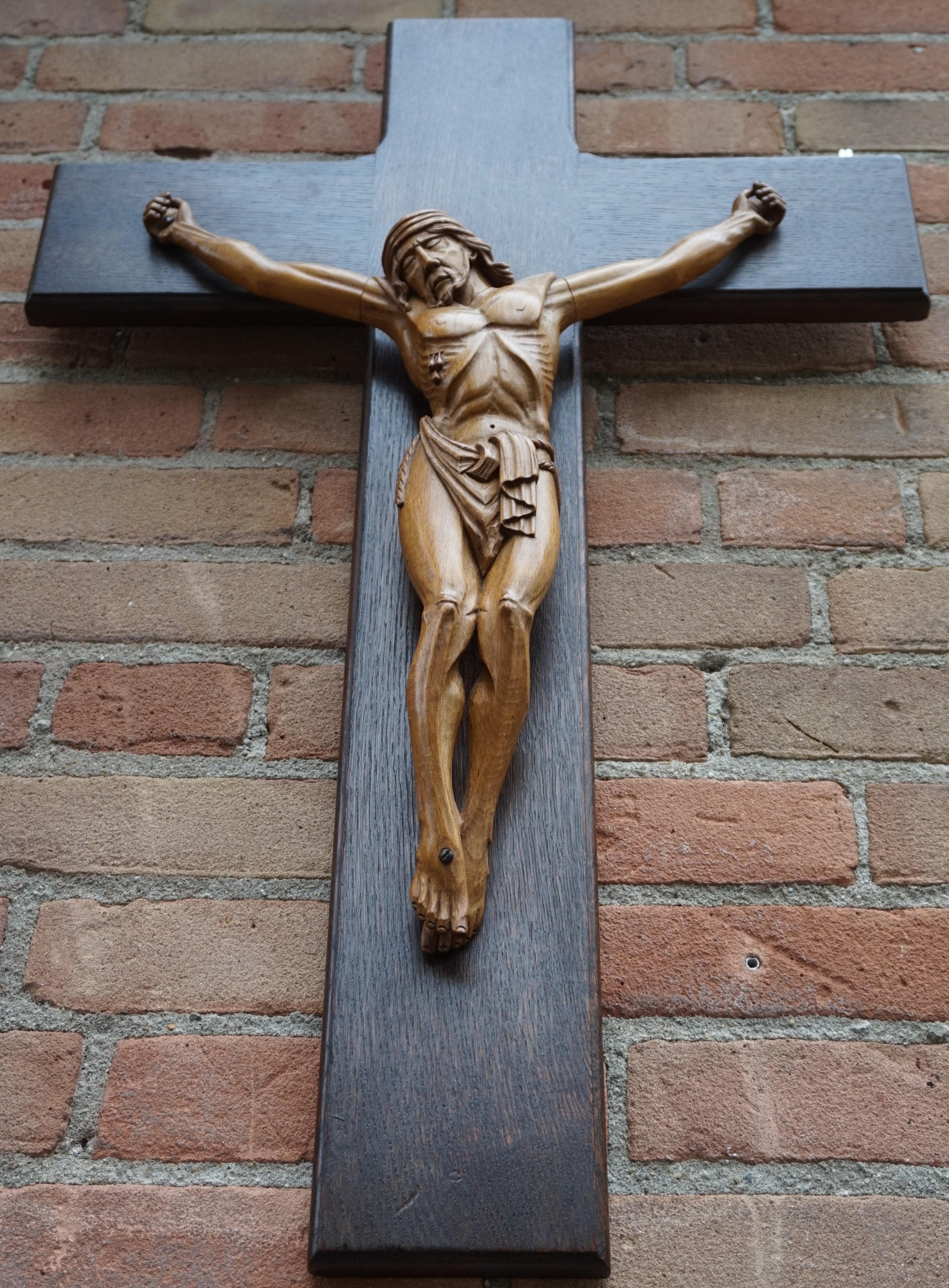 One of a kind, good size crucifix with a wonderful patina.

This remarkable and sizeable crucifix is different to almost all others. The artist who hand-carved this impressive corpus chose to not portray the body and face of Christ in a way that you