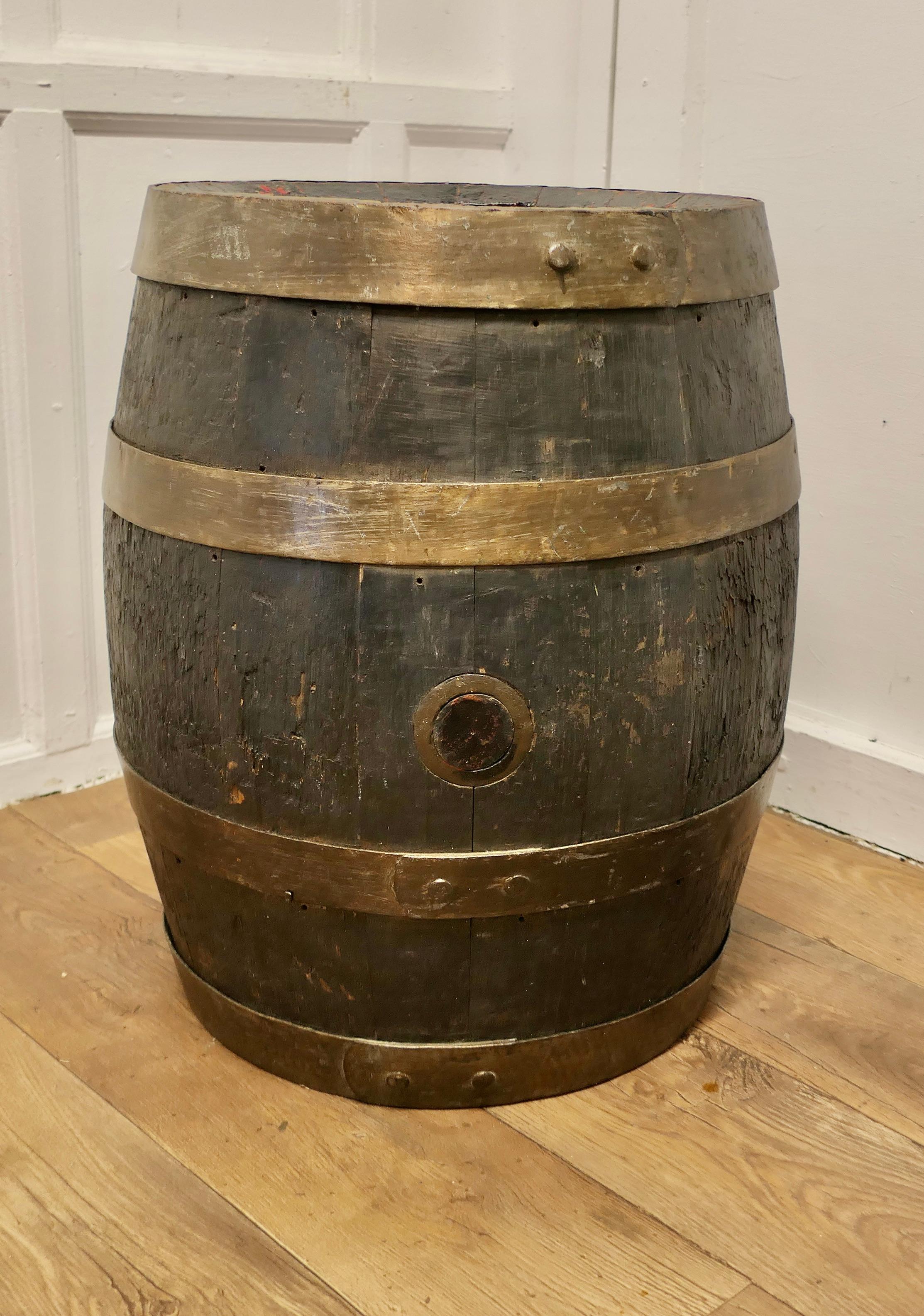 Good Size Oak Brewery Barrel, Table, Log Bin or Christmas Tree 

A superb strong coopered Oak barrel, it is from Brickwoods Brewery, 
This  good looking piece originated as a 19th Century Beer Barrel, it is made with oak staves and bound with metal