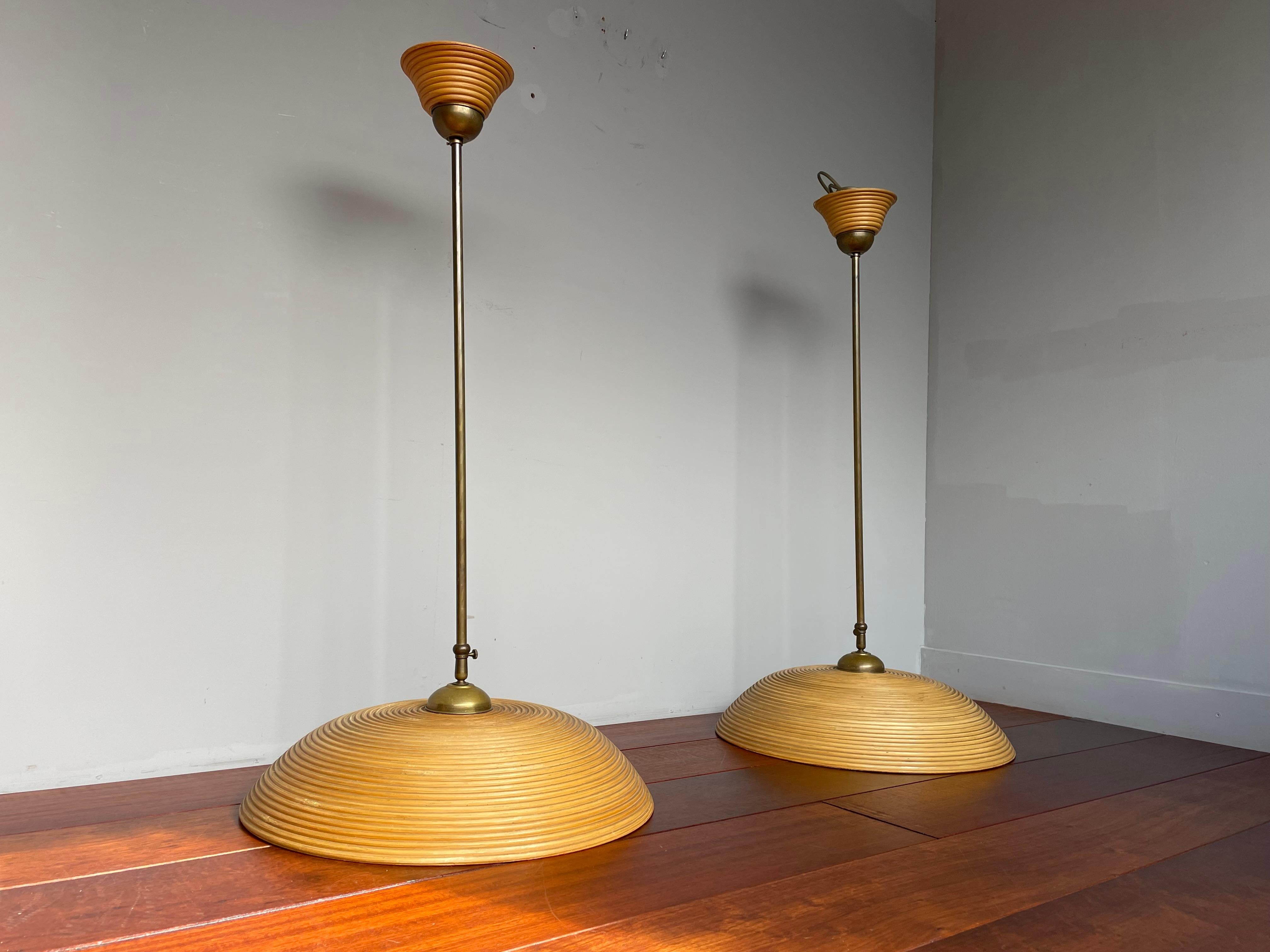 Cast Good Size Pair of Hand Crafted Mid-Century Modern Rattan and Brass Pendant Lamps For Sale