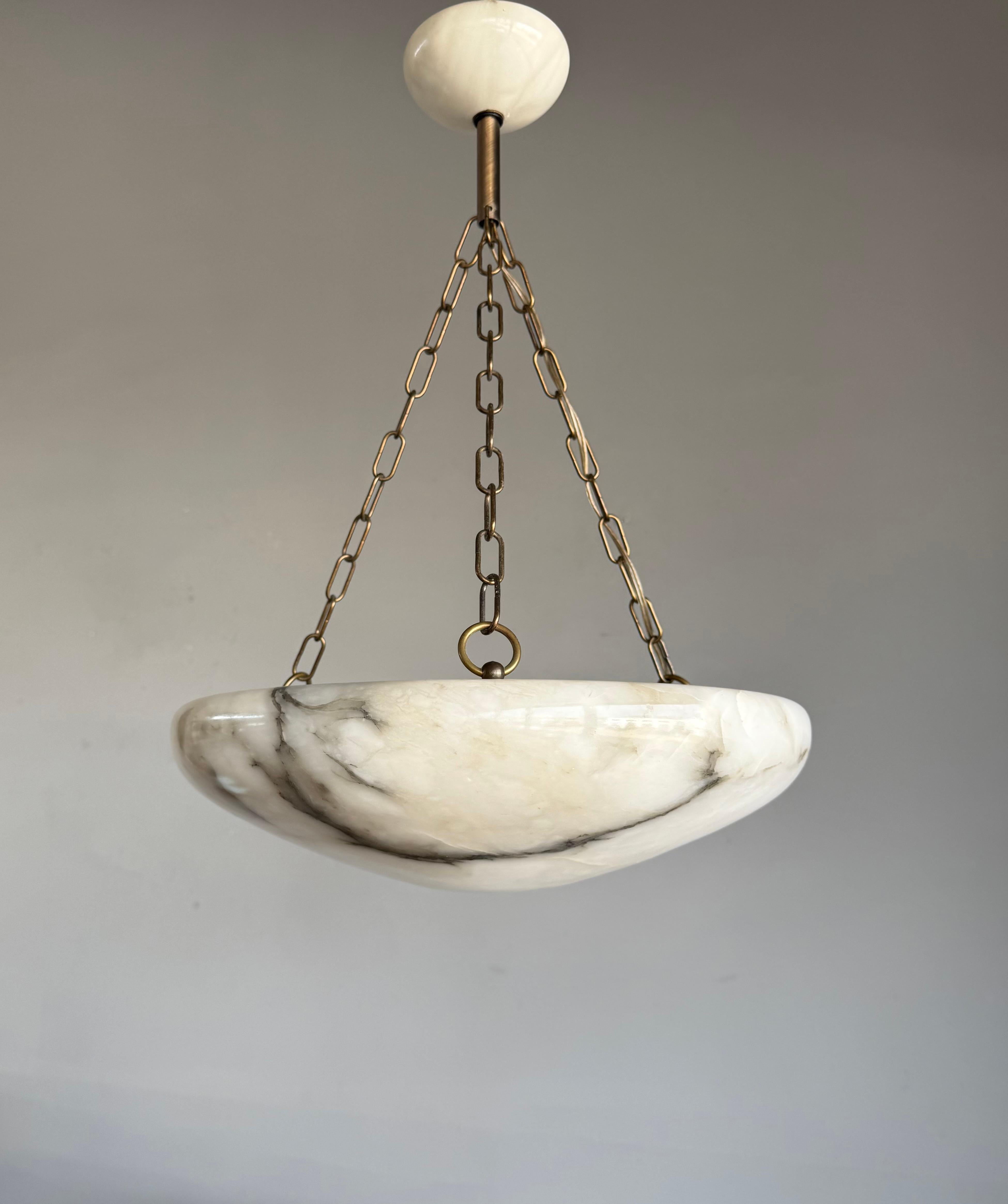 Great shape and practical size alabaster 2-light fixture.

Thanks to its perfect balanced and timeless design this alabaster ceiling light from the Art Deco era is among the more stylish models we have on offer. We have said it many times before,