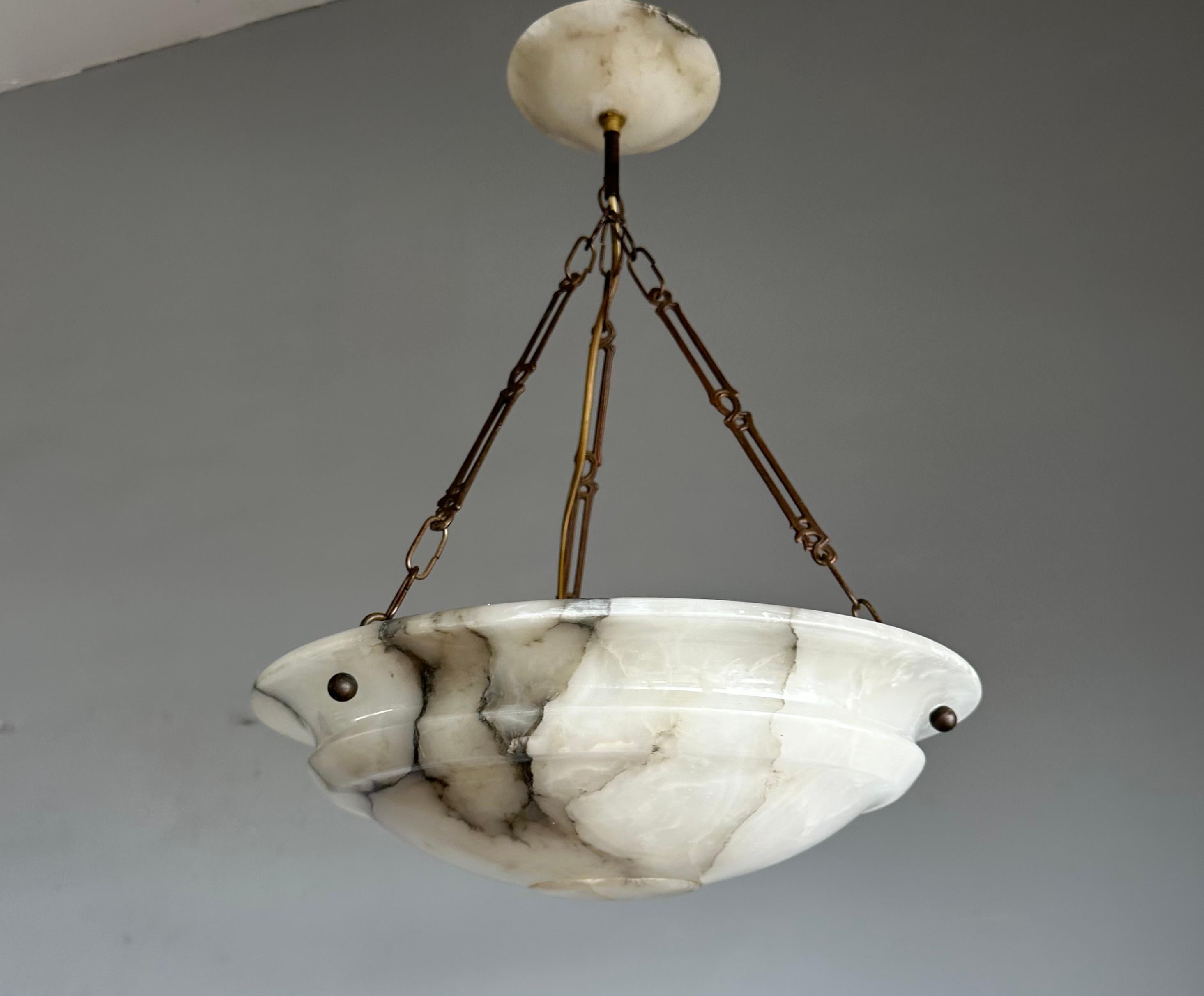 Beautiful and ideal size, 15.9 inches in diameter antique alabaster light fixture.

Thanks to its timeless design this alabaster chandelier from the European Art Deco era is one of the most beautiful models that we have sold over the years. We have