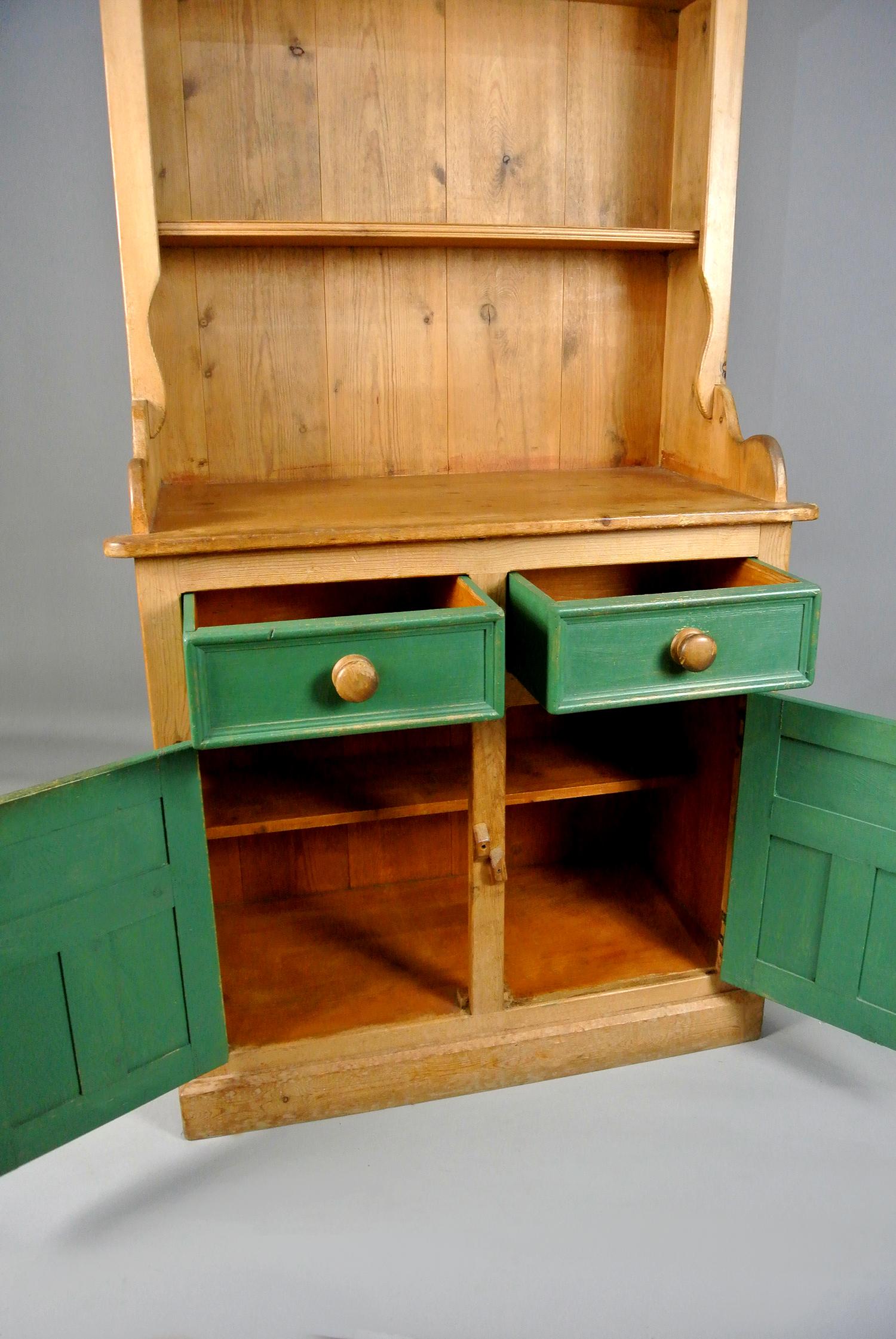 A most attractive solid pine antique dresser in very good condition for age with no worm or wobbles and only minor dings and marks consistent with age and use.

Very heavy and solid, the doors and drawers painted in emerald green with a little light