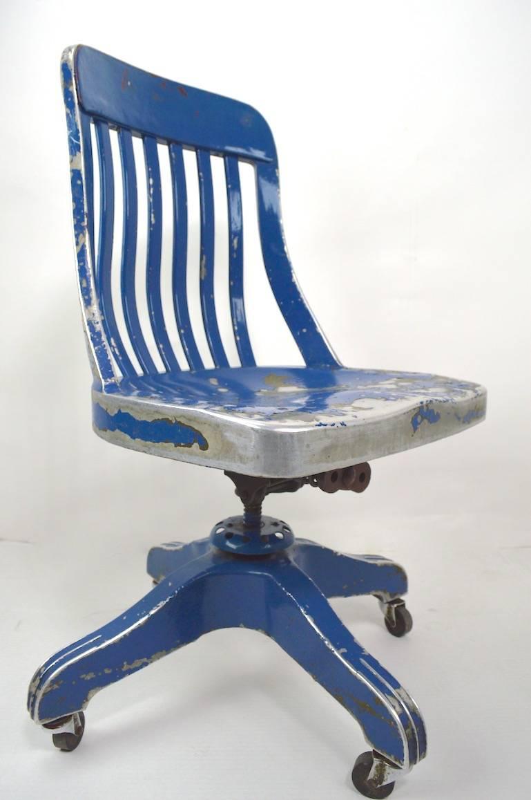 Swivel and tilt desk, task, work chair - solid aluminium frame, in funky later blue paint finish. Seat H 17 (adjusts) the base is on its' original coaster wheel feet. Industrial, Machine Age chair with folky paint finish, the interesting state of
